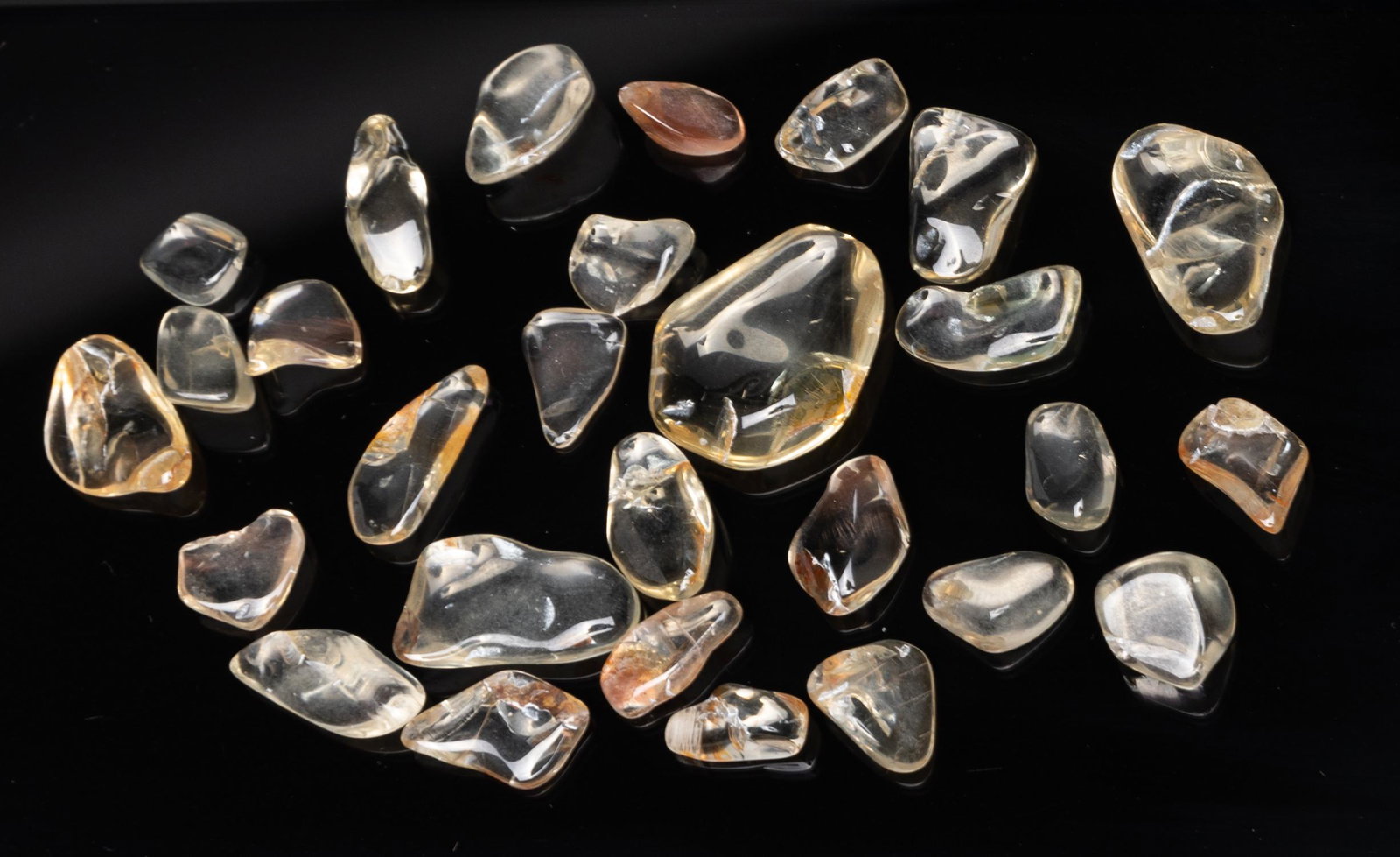 Large Group Arizona Sunstone Diamonds: Large group Arizona sunstone diamonds. 70 ct.
