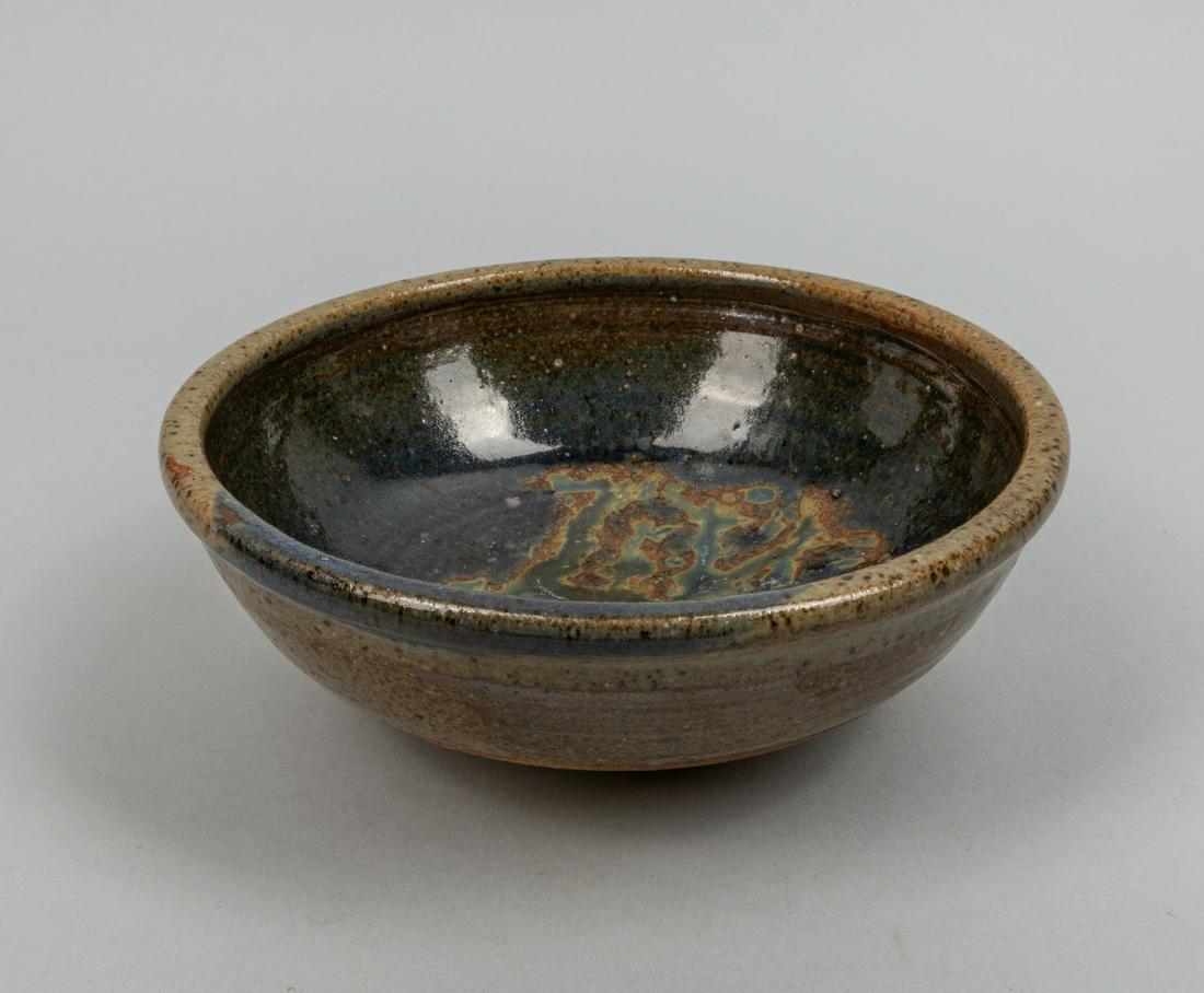 20th Korean Designed Flambe Glazed Pottery Bowl, Signed: 20th Korean designed flambe glazed pottery bowl, signed at the base. 7.5 inch D, 2 inch H.