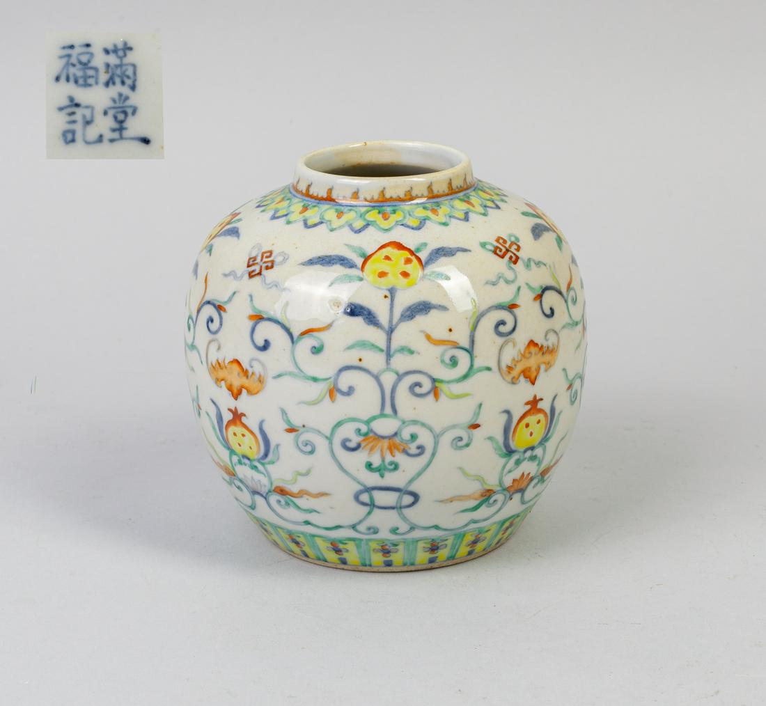 Chinese Douchai Porcelain Jar: Chinese douchai porcelain jar, of ovoid form rising to a short neck, painted on the exterior with auspicious patterns of peach, lotus, bats, with leafy strapwork, the base with four-character mark. 5.