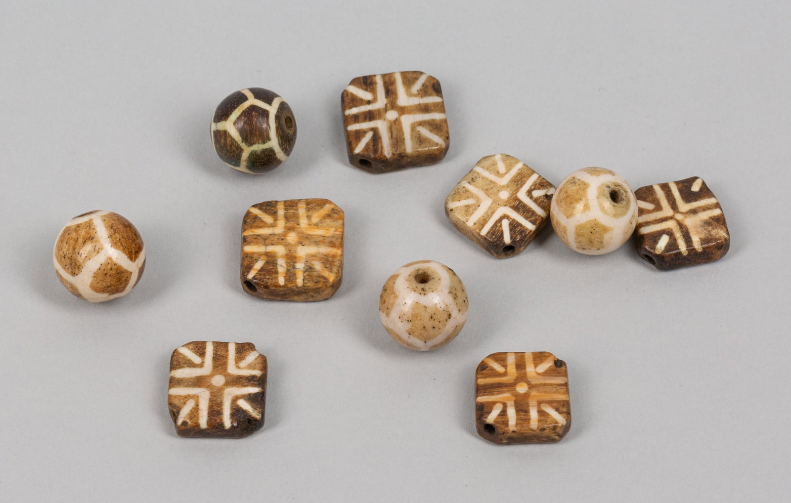 Set Large Bead Pumtek Paleo Beads: Set of large Pumtek paleo beads. 0.83inch D (largest square bead), 0.70inch D (largest sphere bead).