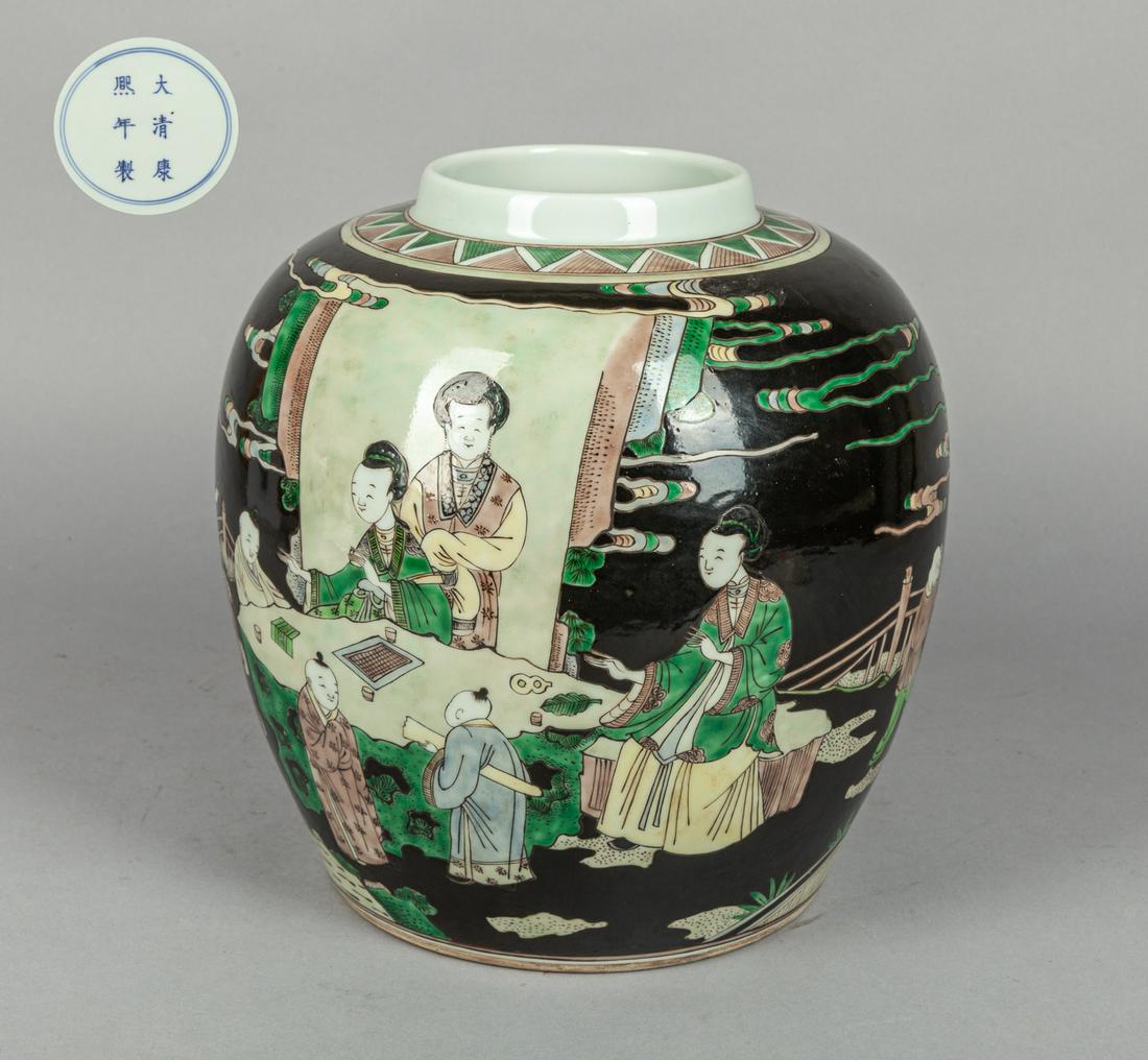 Chinese Wucai Porcelain Jar: The ovoid body painted with a scene of character story on black ground, the base with a six-character mark enclosed by double circles. 10*9.1inch.