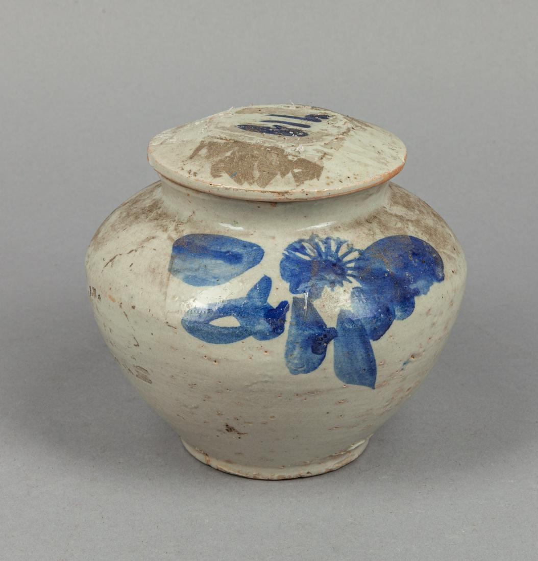 Korean Blue White Porcelain Jar: Of ovoid form, the body cover decorated with flowers in blue tone, with a cover. 5.4*5inch.