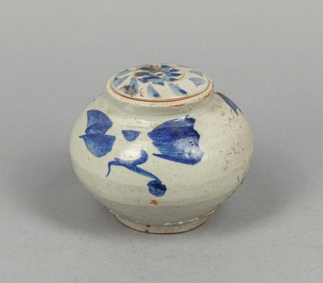 Korean Blue White Porcelain Jar: Of ovoid form, the body and cover decorated with floral patterns in blue tone. 4.4*3.8inch.