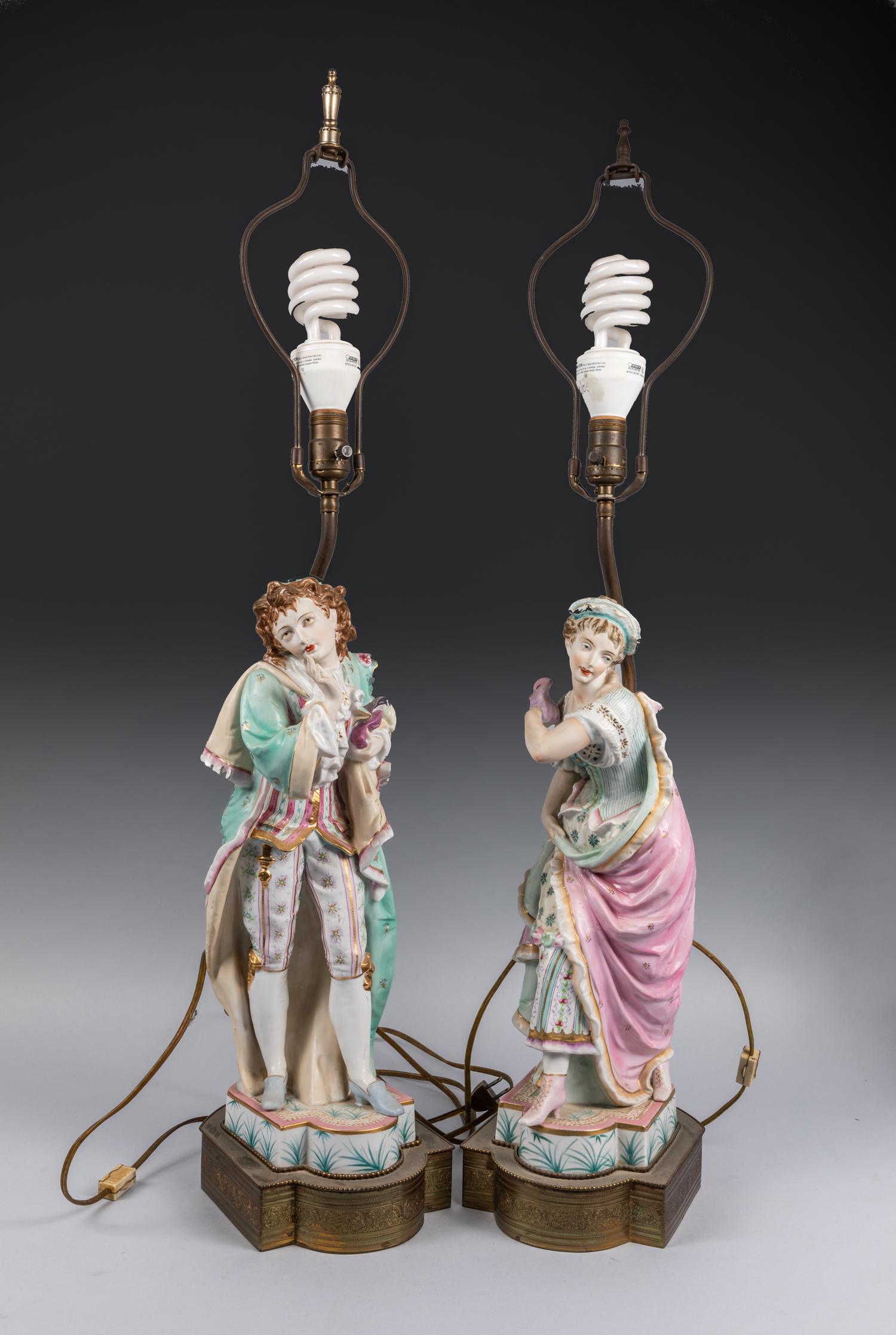 Pair Of German Meissen Style Porcelain Lamps: Pair of famille rose porcelain lamps, both figures are well dressed wearing long robes. 35.7*8.7inch