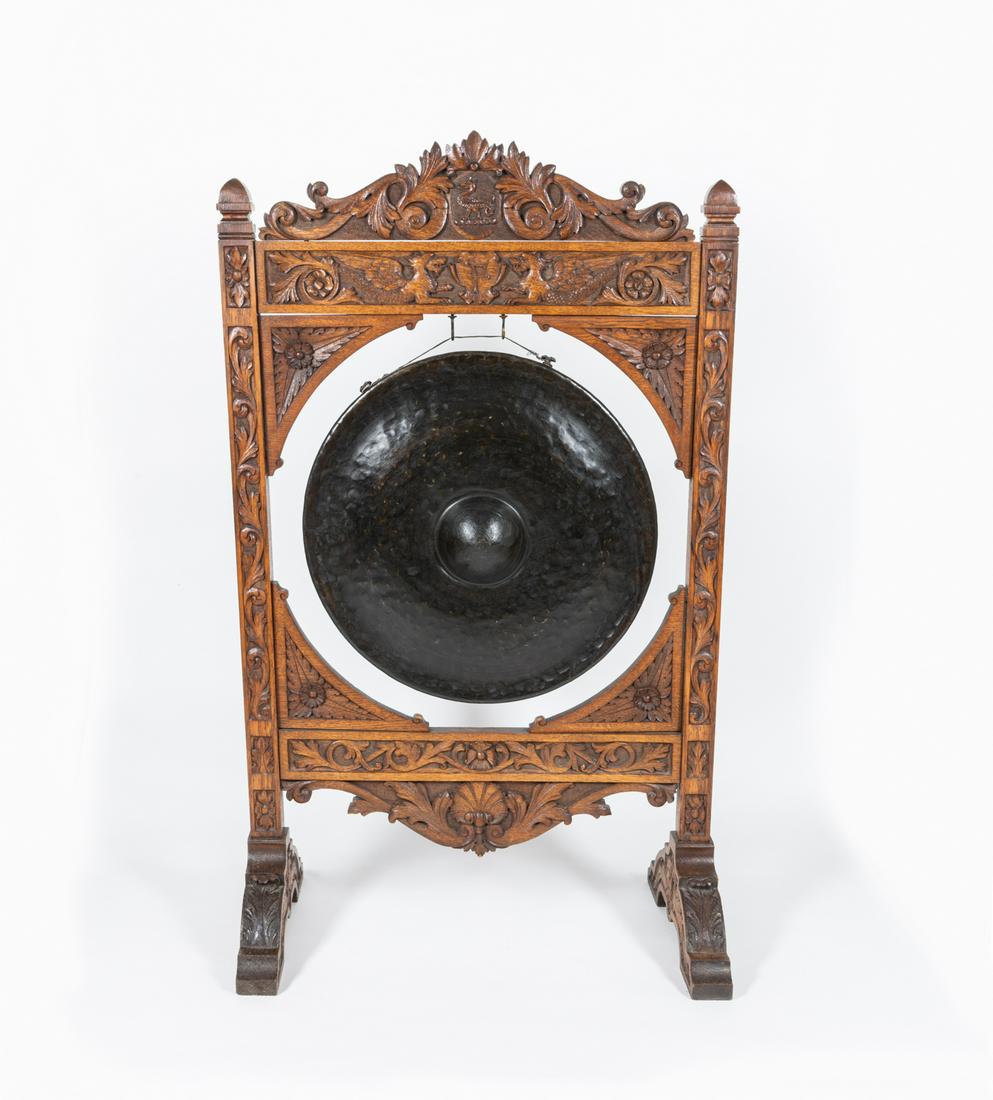 19th Antique England Oak Wood Bell: The circular shape bell suspended on a wood stand, makes lovely sounds as well as being a decorative objects for display, the stand carved with flowers, curly leaves and archaic beasts. 26.8*43.5*15.5