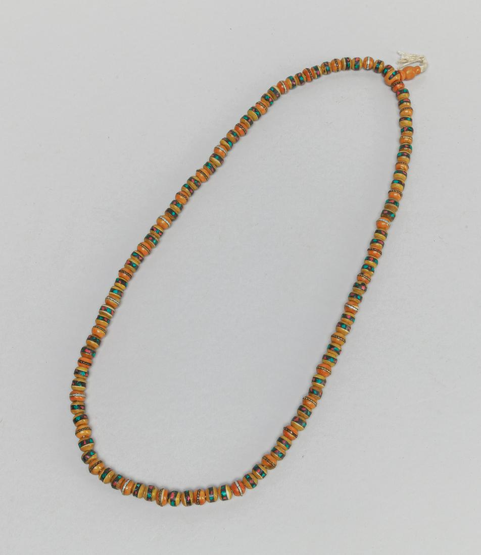 Collectible Tibetan Old Bone Necklace Inlaid Gem Stone: Antique Tibetan type old honey brown color bone bead necklace inlaid with turquoise and coral like stone. 26inch L.