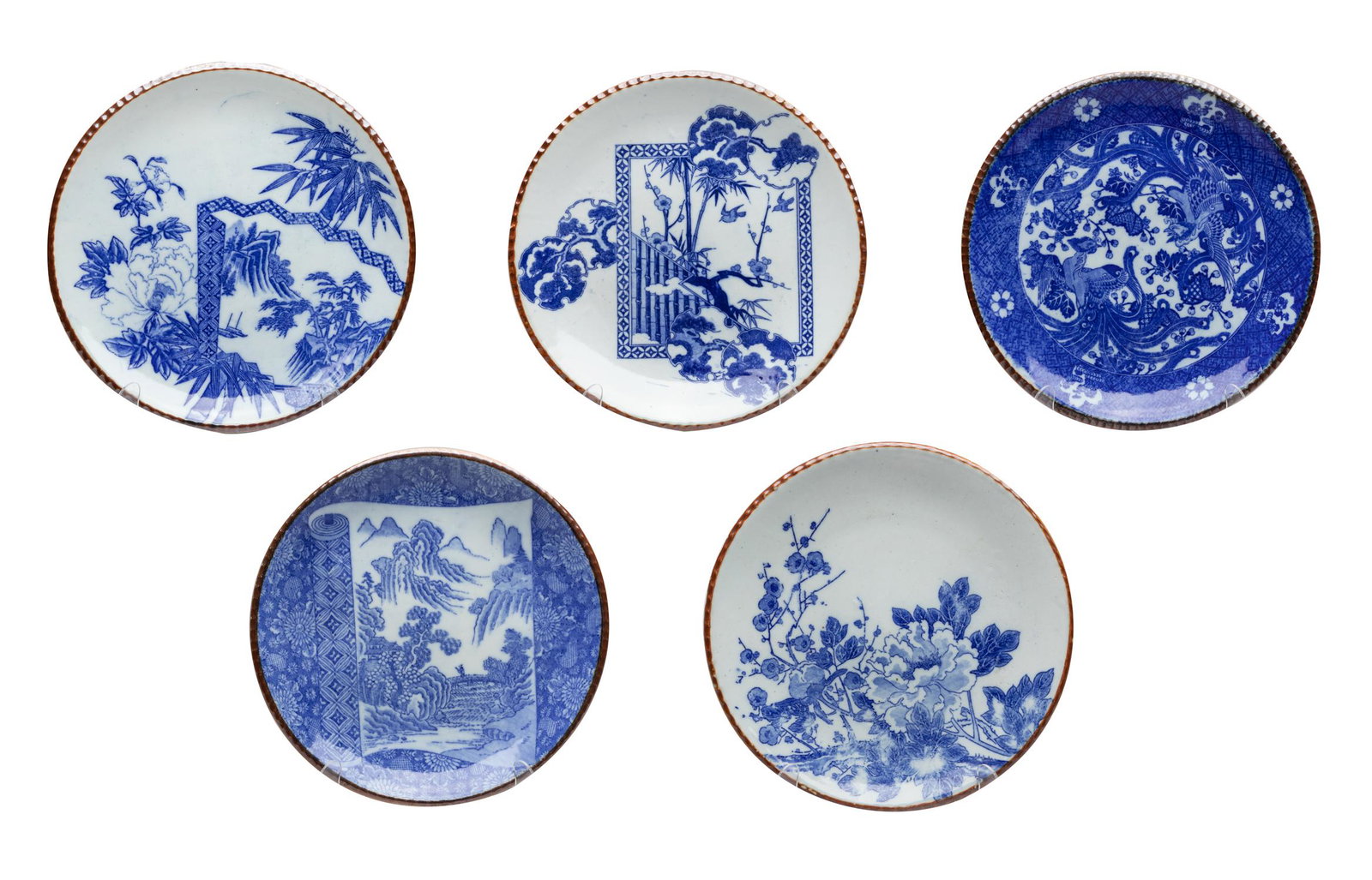 Set Antique/Vintage Blue White Porcelain Plates: Five plates as a group, the interiors decorated with plum blossoms, peonies, chrysanthemums, bamboo, screens, foo dogs or cranes, each with a brown glaze rim. 10inch D (largest).