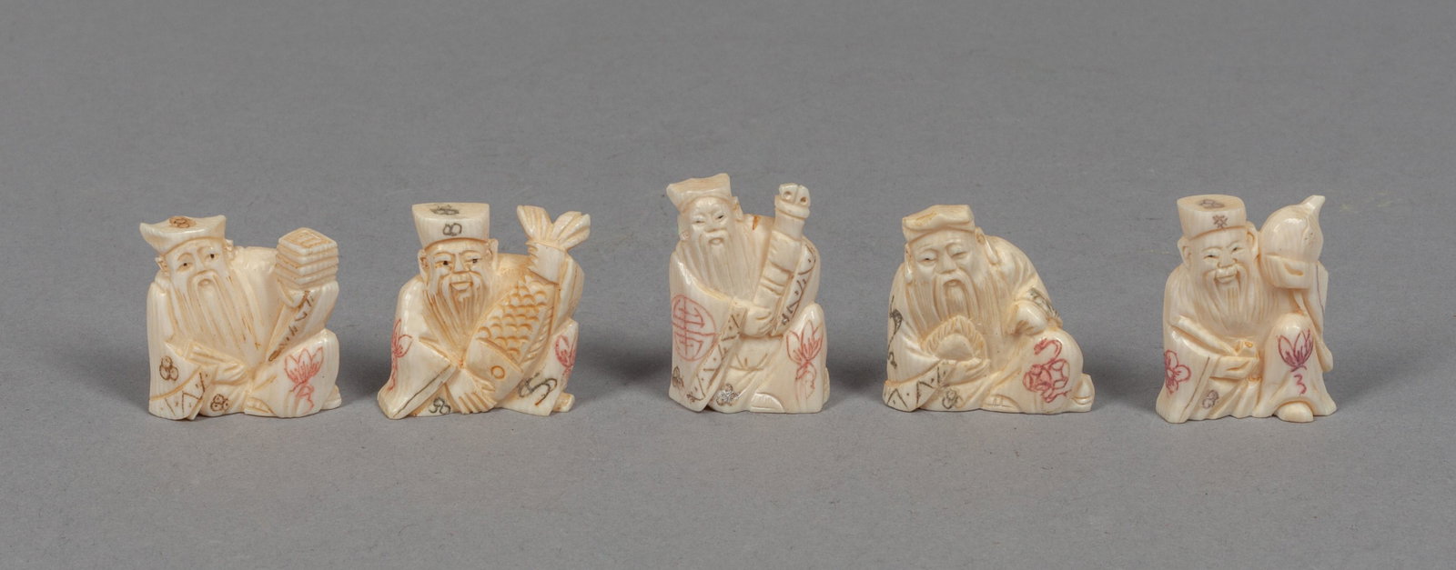 Set Japanese Bone Carved Netsukes: Group of five Japanese carved bone netsukes, all carved in old figure type. 1.3*1.2*0.3inch (largest).