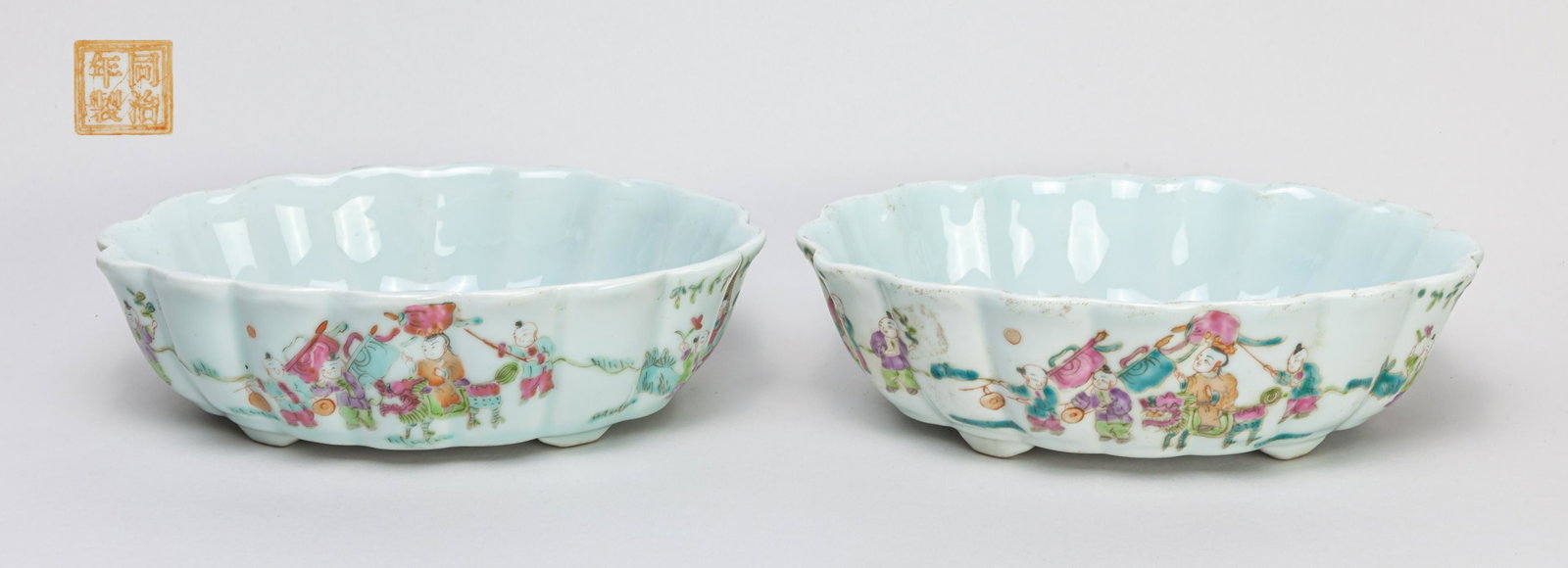 Collectible Pair Chinese Porcelain Pots: Each painted with a scene of figures in various activities to the exterior, base with a seal mark. 9.3*7.3*2.7inch.