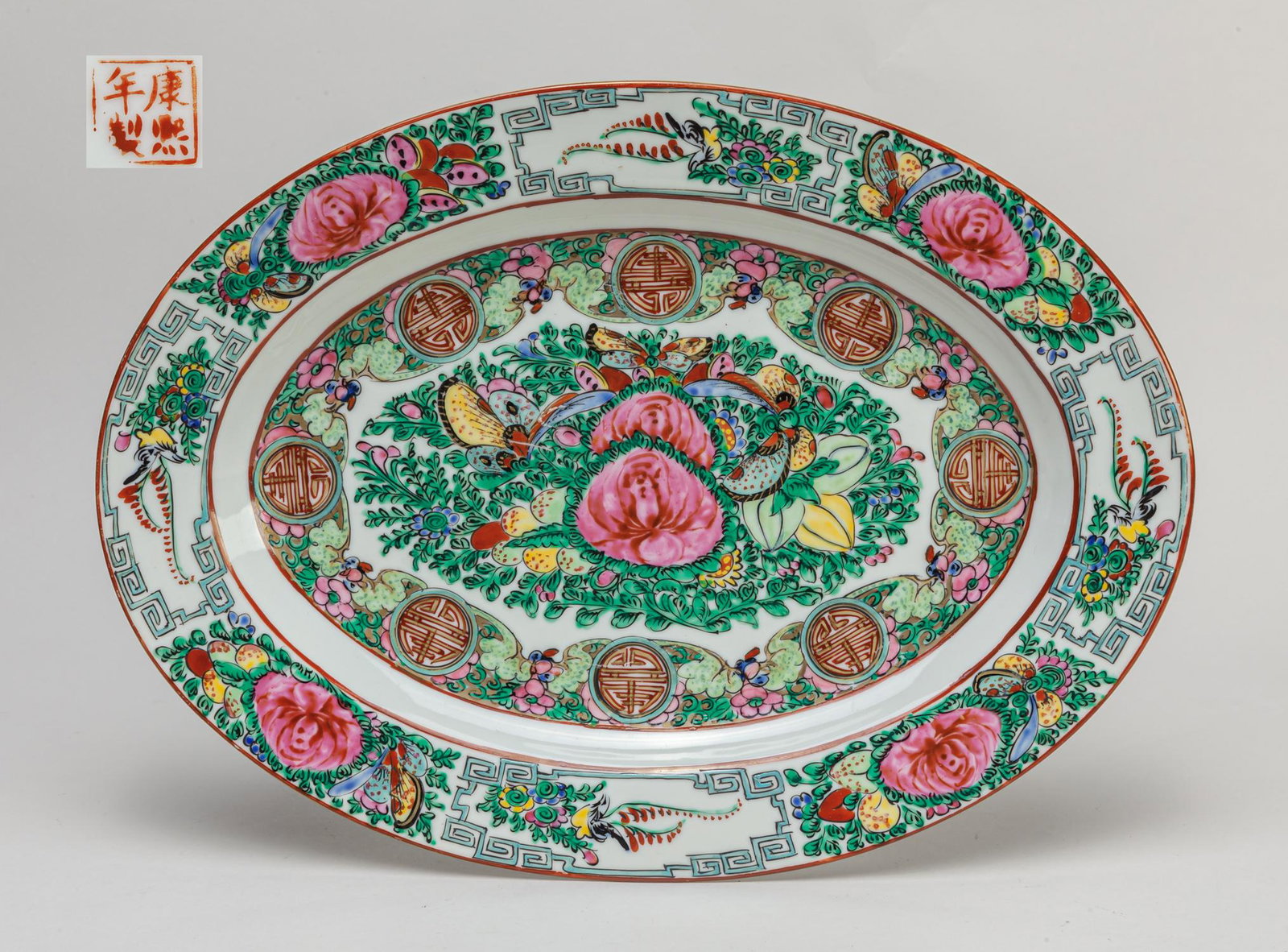 Chinese Export Famille Rose Porcelain Dinning Dish: Painted with flowers, butterflies and shou characters to the interior, base with a seal mark. 14*10.2inch.