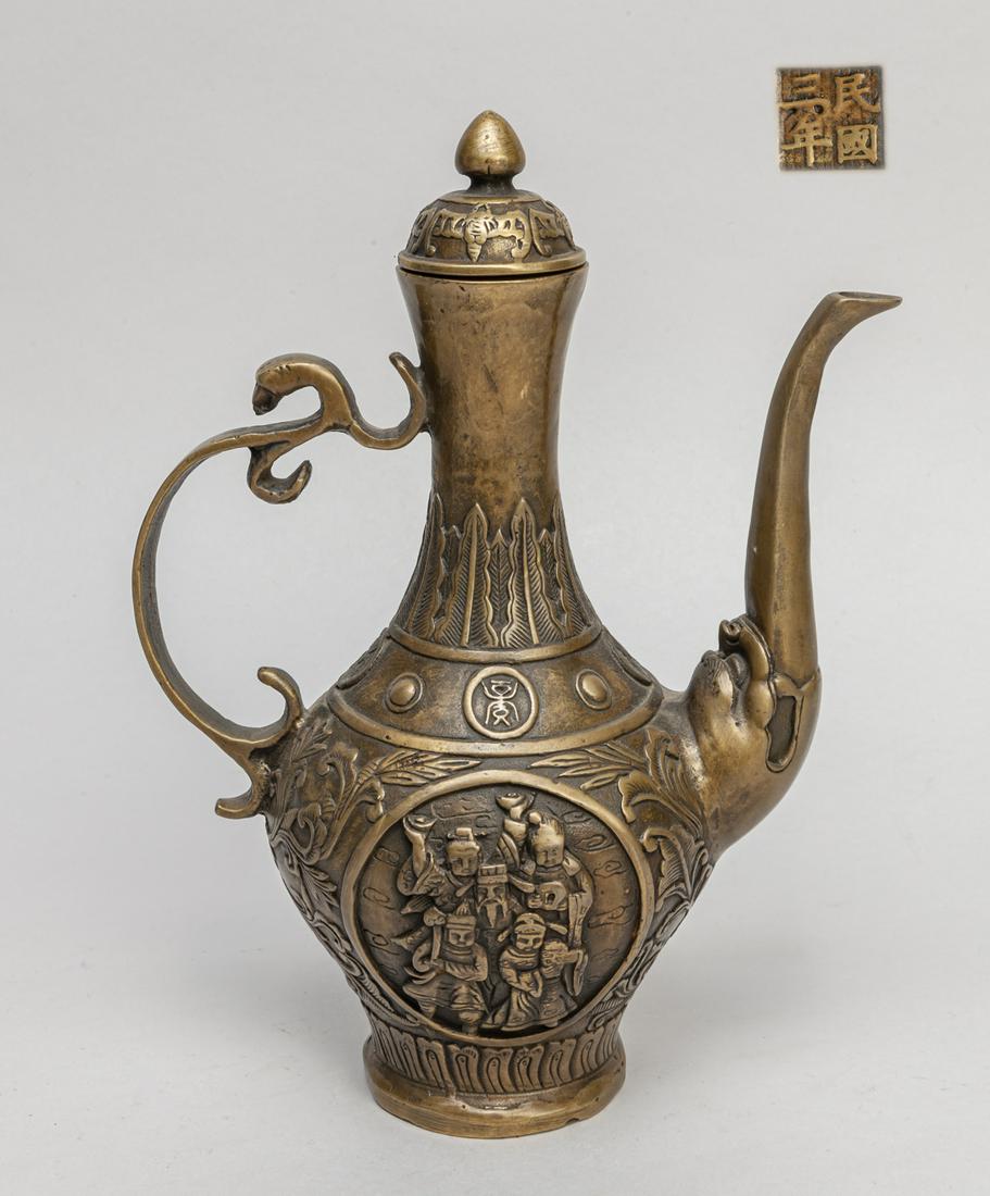 Chinese Copper Tea Pot: Cast with figure panels, foliate scrolls, between bands of leaves and lappets, cover with bats. 8.7*6.5*3.5inch.
