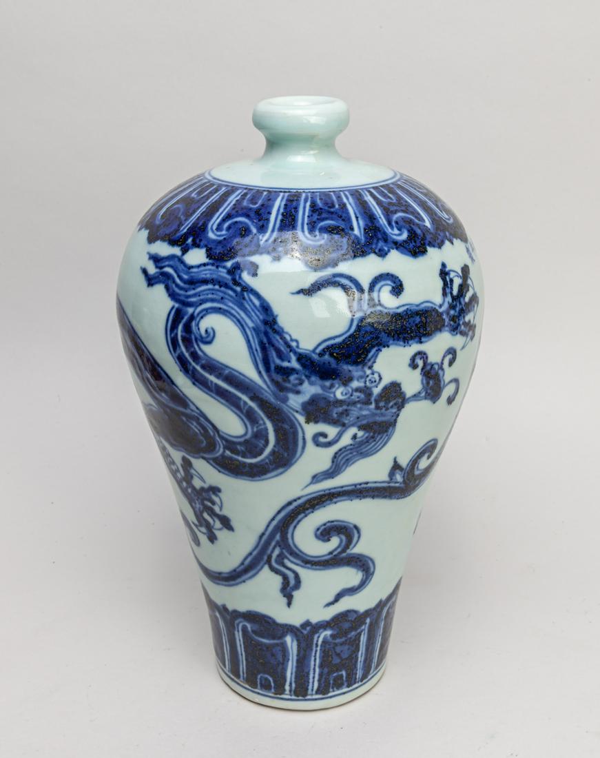 Collectible Chinese Blue & White Dragon Vase: The baluster body painted with a four-clawed coiled dragon between bands of lappets, shoulder with a six-character mark. 11.3*6.5inch.