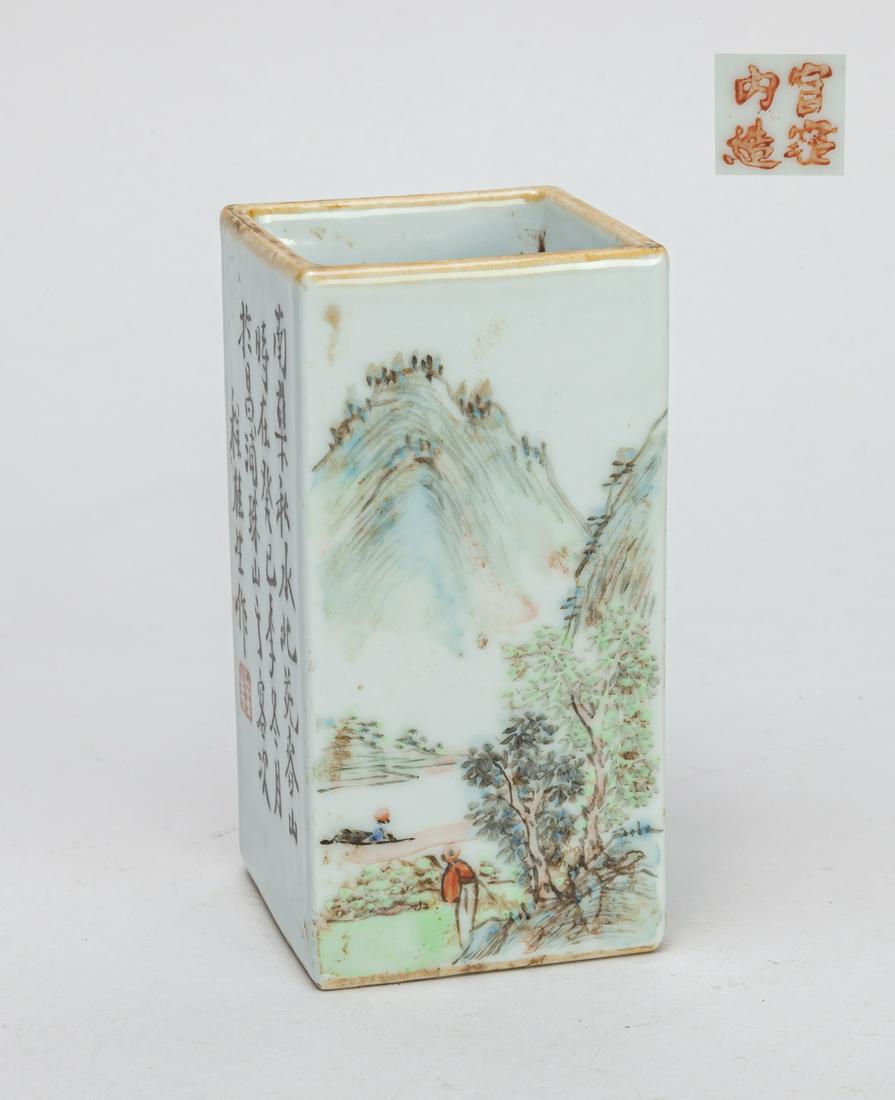 20th Chinese Famille Rose Porcelain Brush Pot: Of square section, two sides painted with landscape scene, the other two inscribed with related passages and seal marks, base with a four-character mark. 3.8inch H, 2inch W.