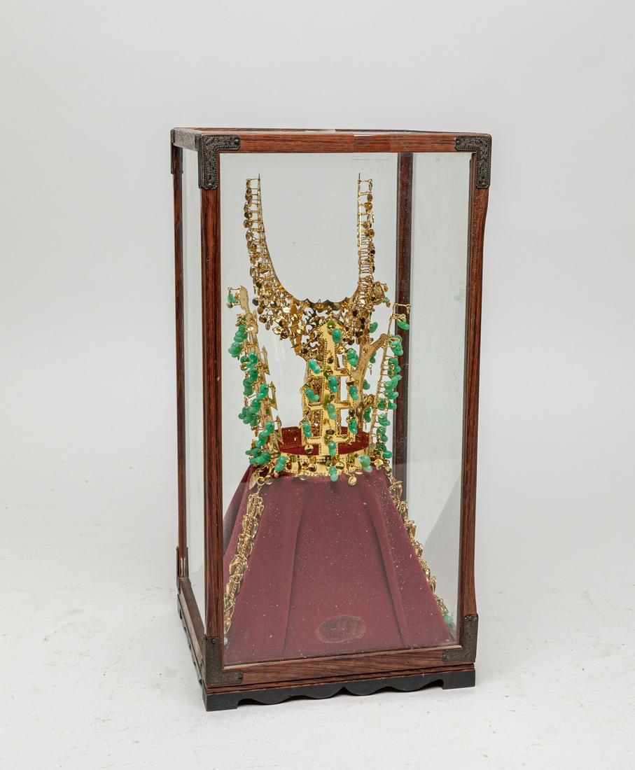 Korean 24K G/F Crown Sculpture: Elaborate Korean type 24K gold plate crown decor, inlaid with light green gemstone, with display case. 12inch H, 6inch W (case size).