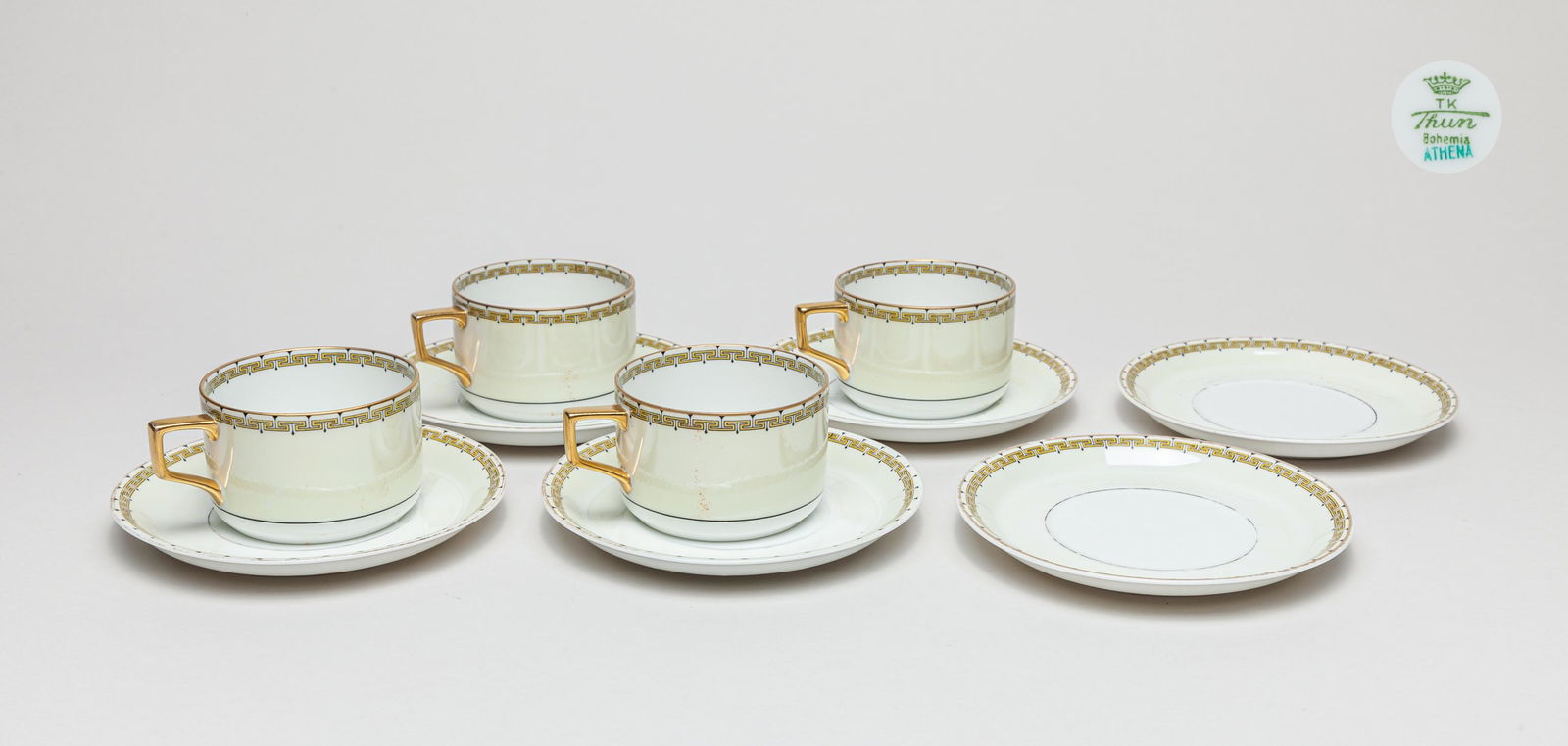 Bohemia Porcelain Tea Sets: Including tea cups and saucers, decorated with continuous fret motifs to rims, each base marked Bohemia. 4.1inch L, 3.2inch W, 2.1inch H (cup).