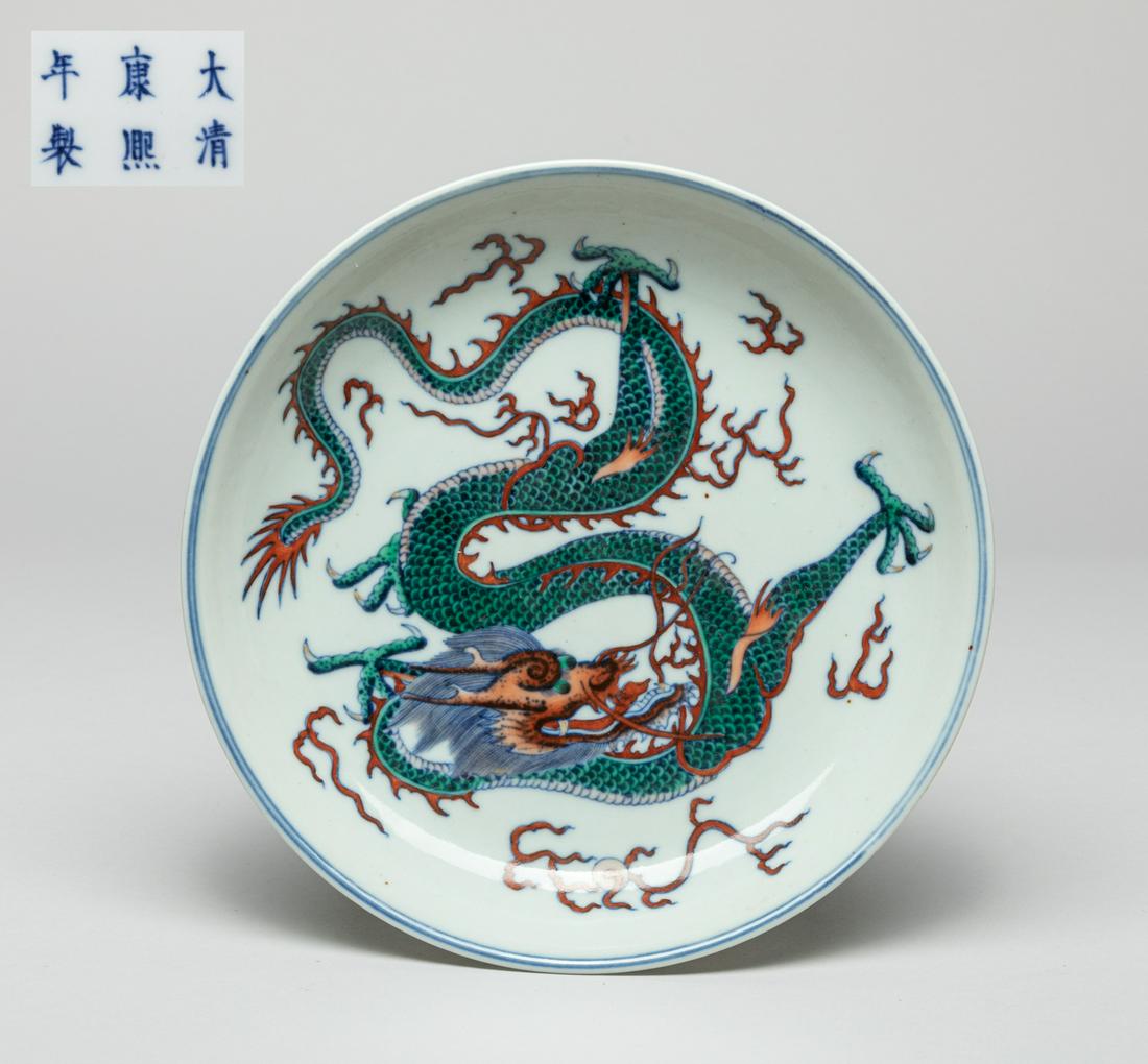 Chinese Douchai Porcelain Dragon Plate: The interior painted with a ferocious four-clawed dragon coiling amidst flames, the exterior with three lingzhi, the base with a six-character mark in cobalt-blue. 7.5inch D.