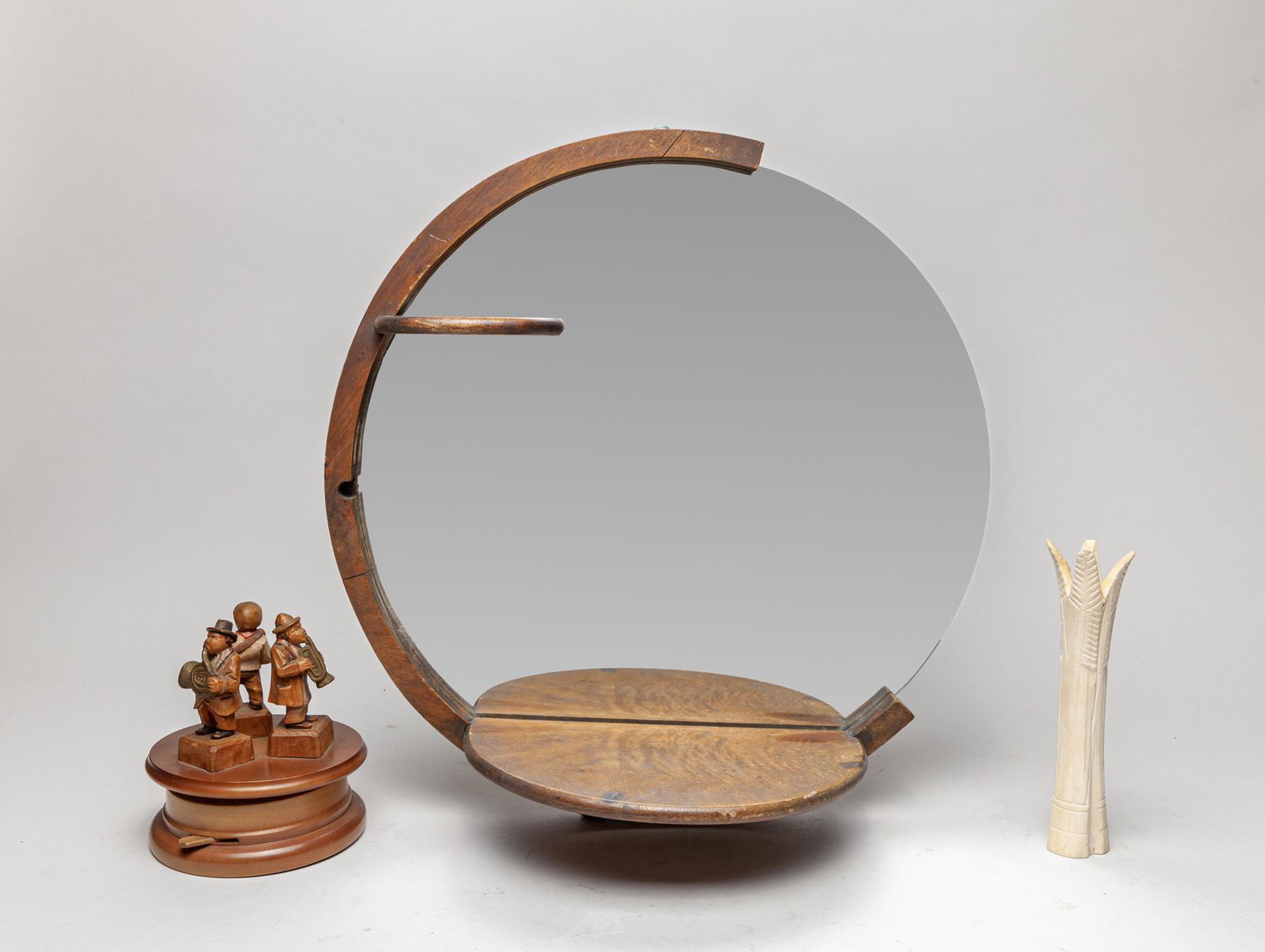 English Type Wall Hanging Wood Mirror: Including a wall hanging circular wood mirror, a carved wood decor sculpture, and a bone carving. 16.7inch H, 6inch W (mirror size).