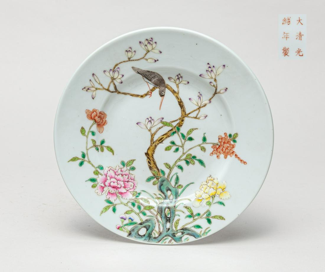 Chinese Famille Rose Porcelain Plate: The interior enameled and painted with a bird and various flowers, the exterior with five bats and the base with a six-character mark in iron red. 7inch D.