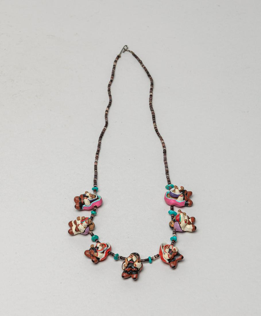 Native American Southwest Storyteller Necklace: Collectible Native American Southwestern type necklace, comprised of shell heishi beads, turquoise and painted clay storyteller beads. 24inch L.