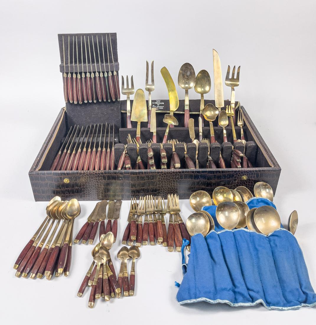 Rare Gorham Rosewood and Brass Dinner Service: A large group of collectible Gotham rosewood and brass knives, spoons, forks and dinner serving pieces, with wood box. 21.5inch L, 13inch W (box size).