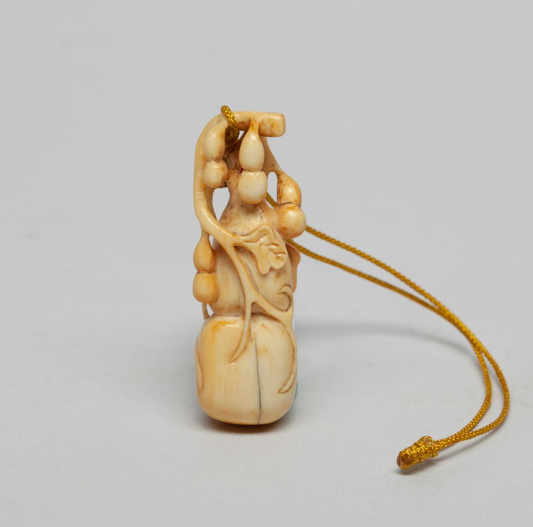Antique Chinese Bone Like Carving: Carved as a large double gourd borne on leafy stems issuing more smaller gourds. 1.93inch L, 0.6inch W.