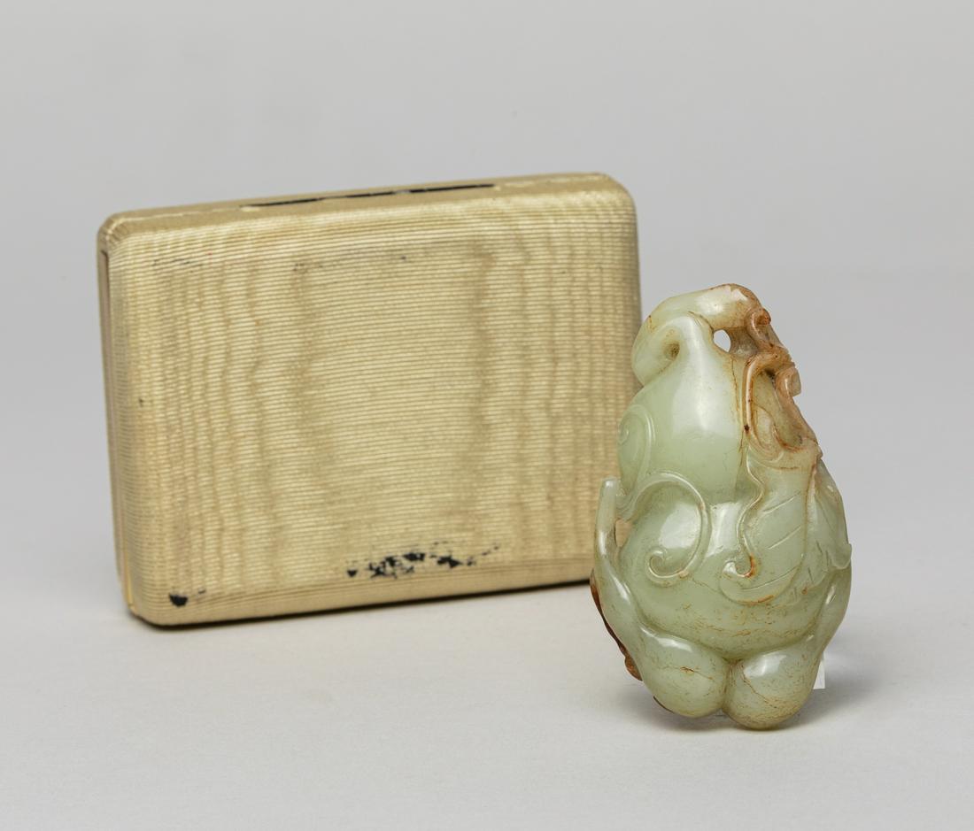 Chinese Russet Jade Carving of Gourd: Naturalistically carved in double gourd form, borne on gnarled stems issuing smaller gourds, leaves and curling tendrils around the gourd body, with a perched bat, the stone of a pale celadon color wi
