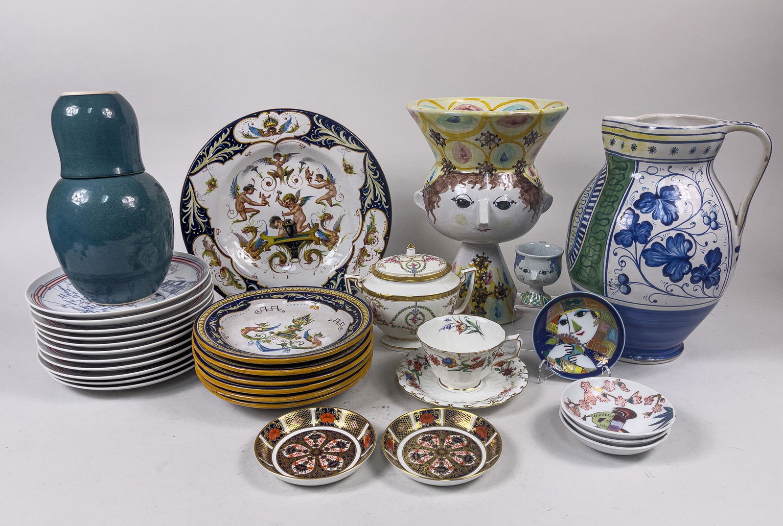 Group Vintage Italy & World Porcelains: A large lot of vintage style porcelain wares, including plates, tea cups, vase and a pot. 11inch H, 8inch L, 8inch W (largest).
