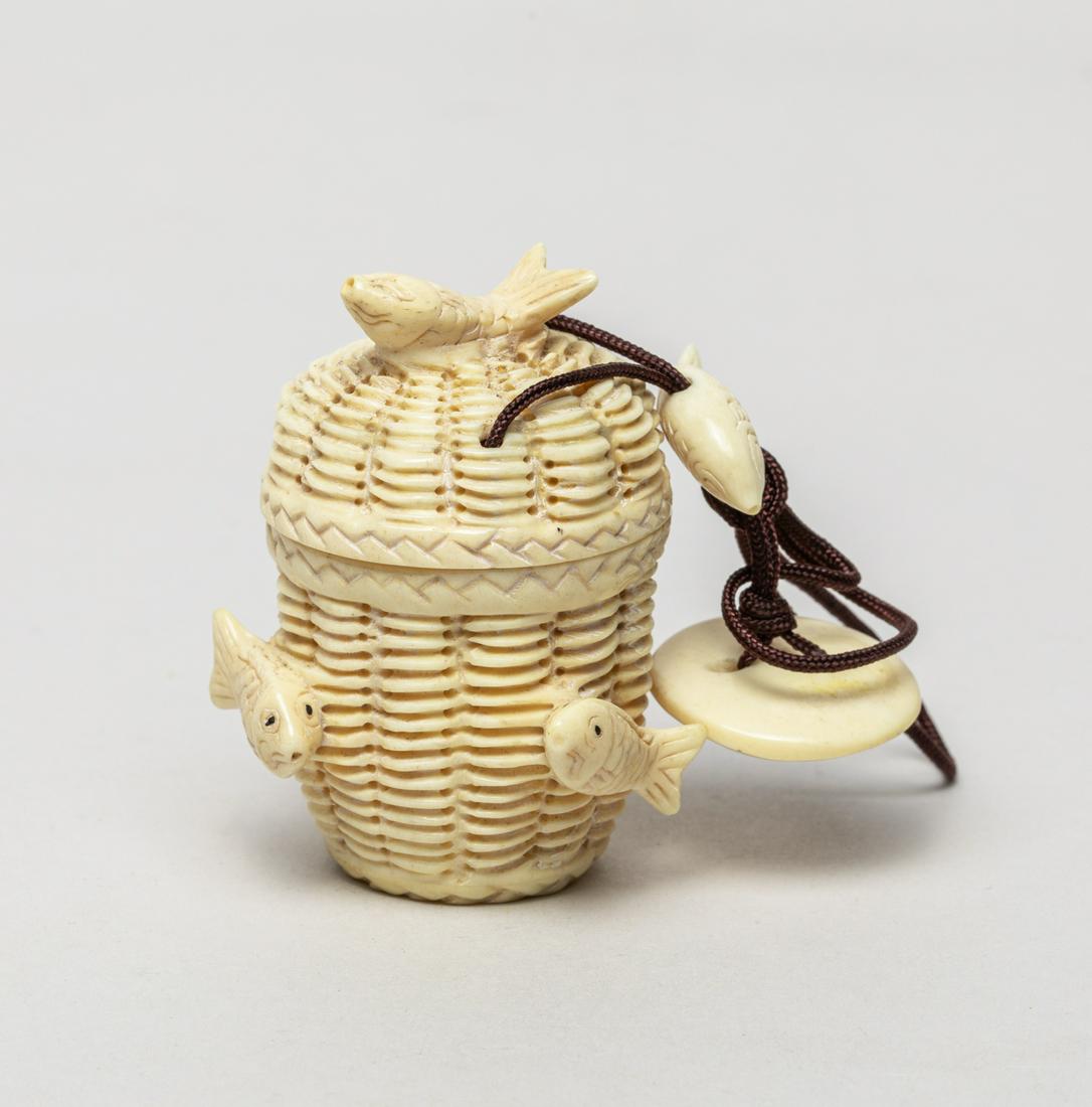 Taisho Type Japanese Bone Carved Inro: Overall worked in basket form, carved in high relief with fish on the inro and cover, suspended on a string with carved fish and fish disc. 2.5inch H, 1.9inch W (inro size).