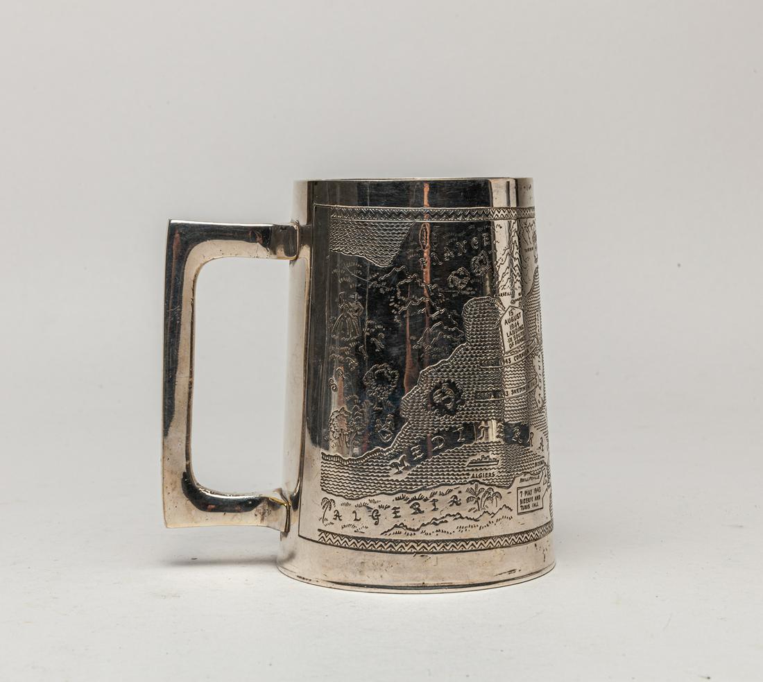 Marked World War ll Silver Plated Tankard: Collectible silver-plated brass tankard, the exterior incised with European map and marked World War II. 4.5inch H, 3.5inch D.