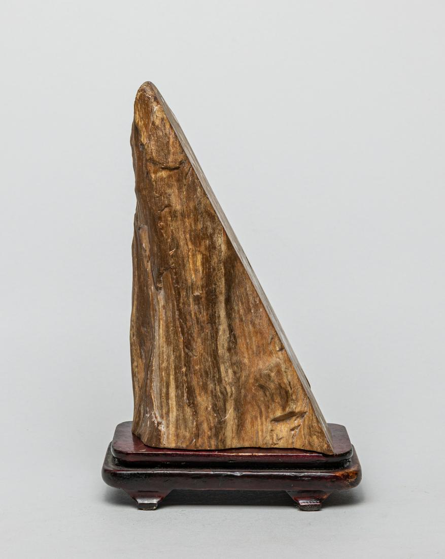Rare Chinese Fossil Wood Scholar Stone: Collectible Chinese scholar stone sculpture with wood stand, with a smoothed flat side, scholar stone, also known as gongshi, are naturally occurring or shaped rocks which are traditionally appreciate