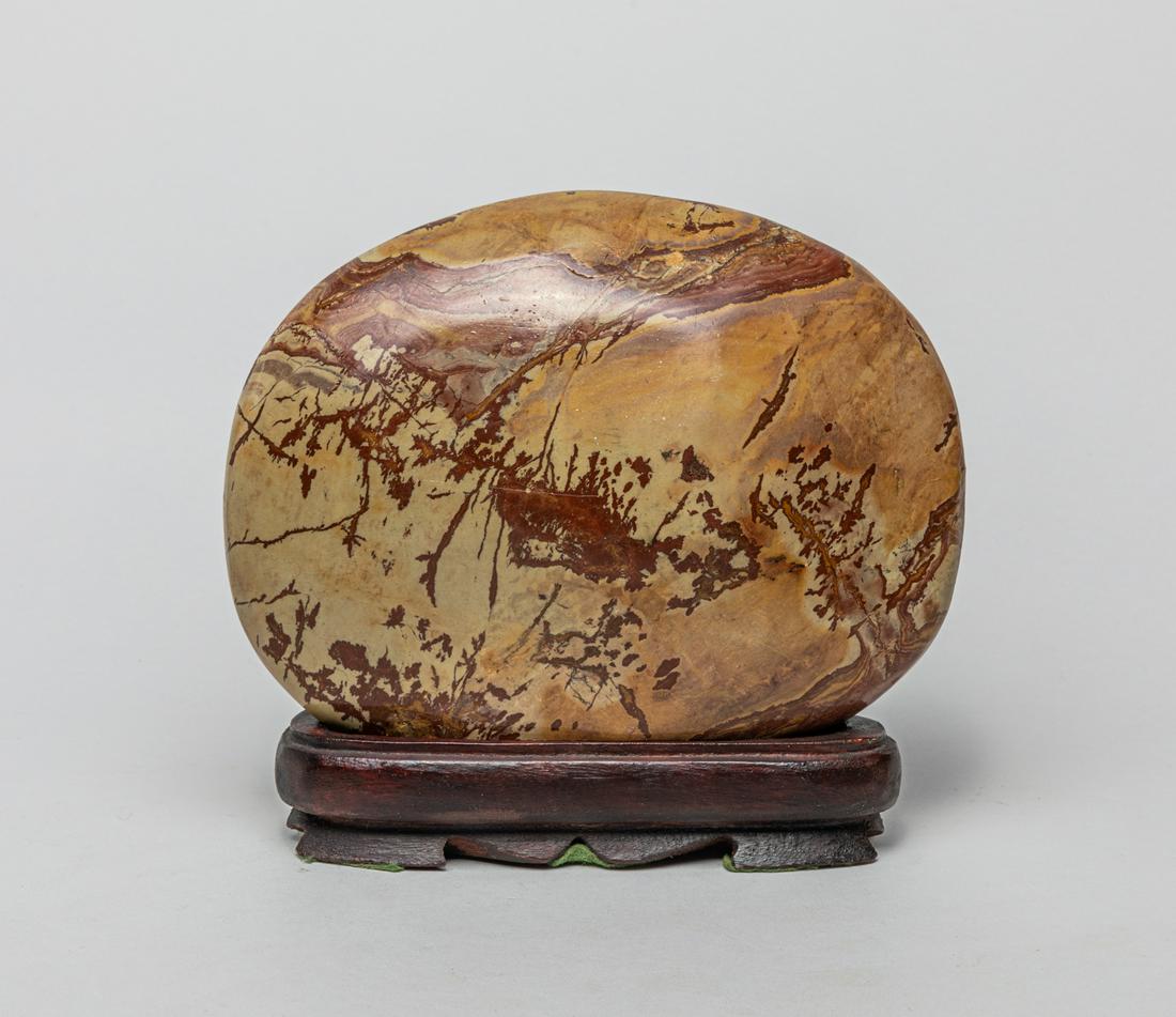 Collectible Chinese Scholar Stone: Chinese scholar stone sculpture, the surface finely carved and smoothed, with wood stand, scholar stone, also known as gongshi, are naturally occurring or shaped rocks which are traditionally apprecia