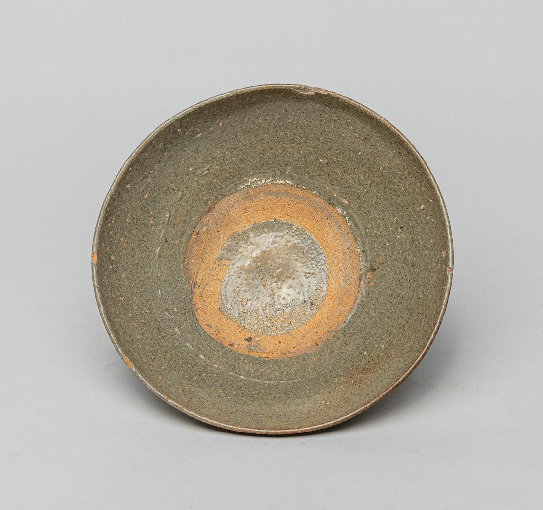 Chinese Sung Shipwreck Yue Type Porcelain Bowl: Well potted with rounded sides resting on a tapered foot, applied overall a grayish celadon glaze save for the foot. 6.7inch W, 2.1inch H.