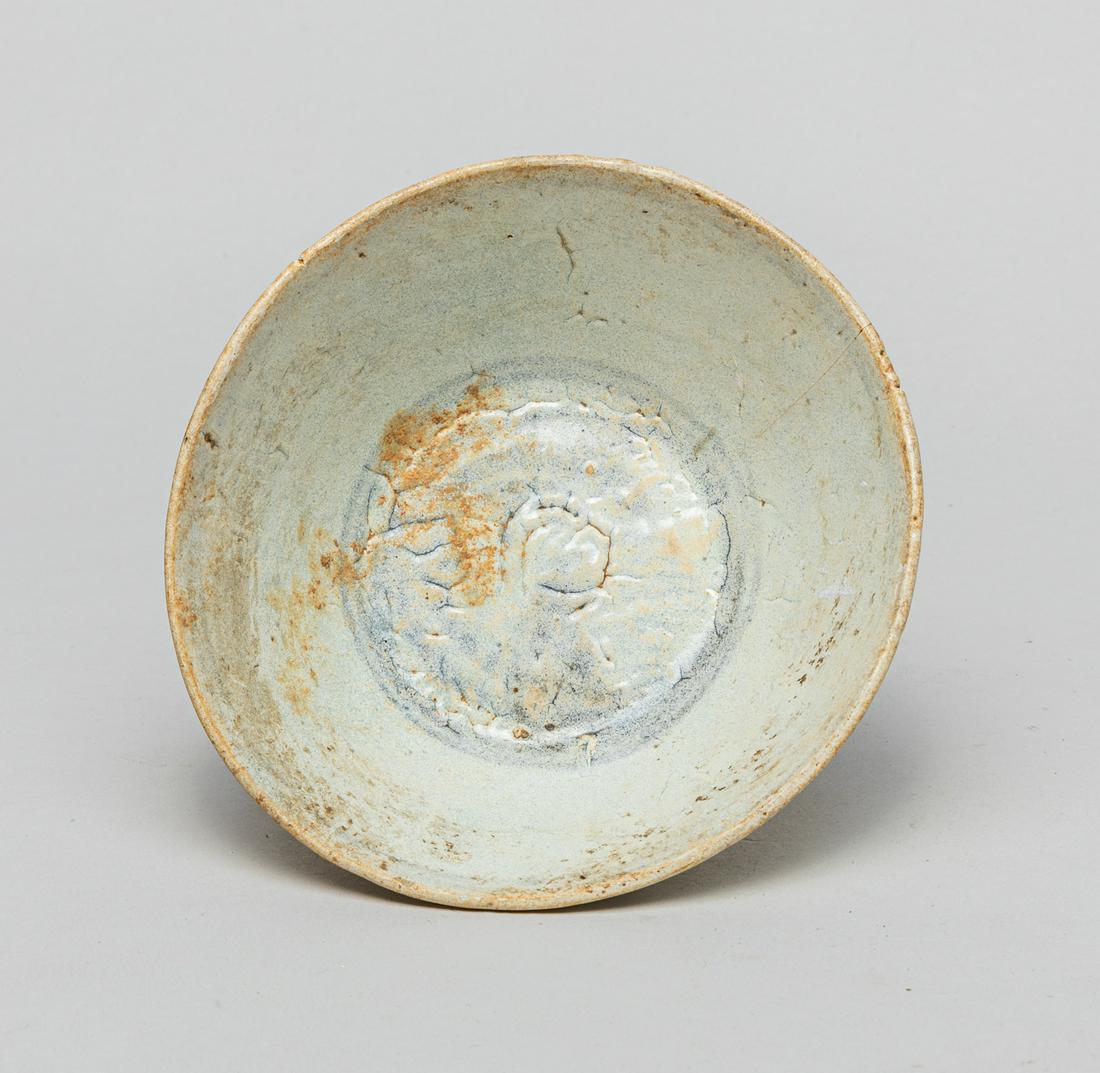 Korean Old Shipwreck Porcelain Bowl: Well potted, applied to the interior centre with a mixed creamy and dark blue glaze, the sides with a mottled pale milky blue glaze to the inside and out, the unglazed base revealing the burnt porcela