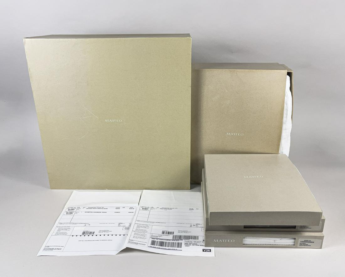Matteo Linens Set: Set of Matteo linens, including one bed sheet, one duvet cover, and three pair of shams with original boxes. Size varies.