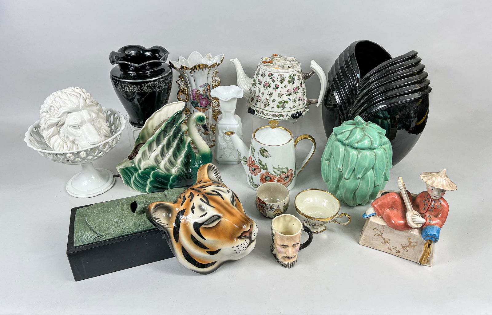 Collectible Art Porcelain & Decors: Including decorative vases, tea pots, cups, animal sculptures and table decors. Approx. 12.7inch H, 11.2inch L, 8inch W (largest vase).