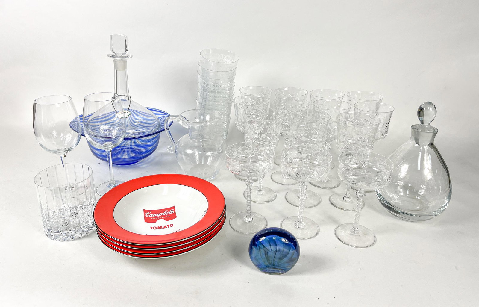 Estate House Crystal Glass Pieces: Including a large group of wine glasses, glass decanters, glass cups, art glass decors and porcelain plates. 10.5inch H, 7.2inch W (largest).