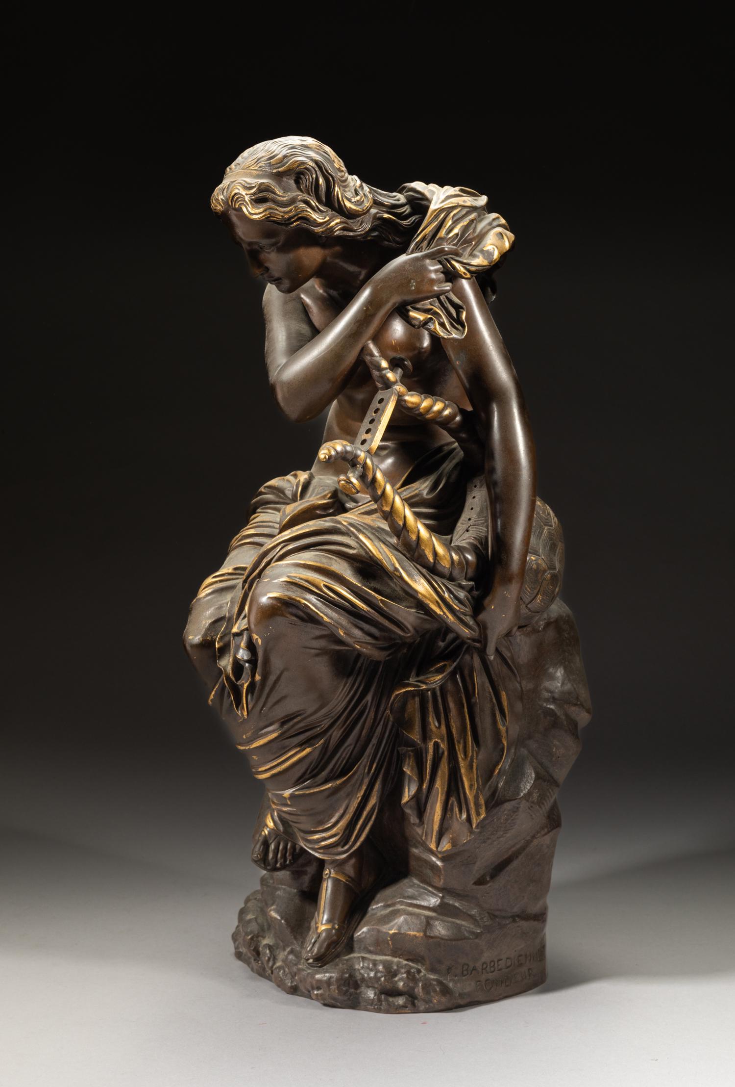 Italy Bronze Sculpture of Lady: Cast as a seated lady looking downward, her right hand grasping a scarf and left hand holding a harp. Approx. 16.7inch H, 7.7inch L, 7.5inch W.