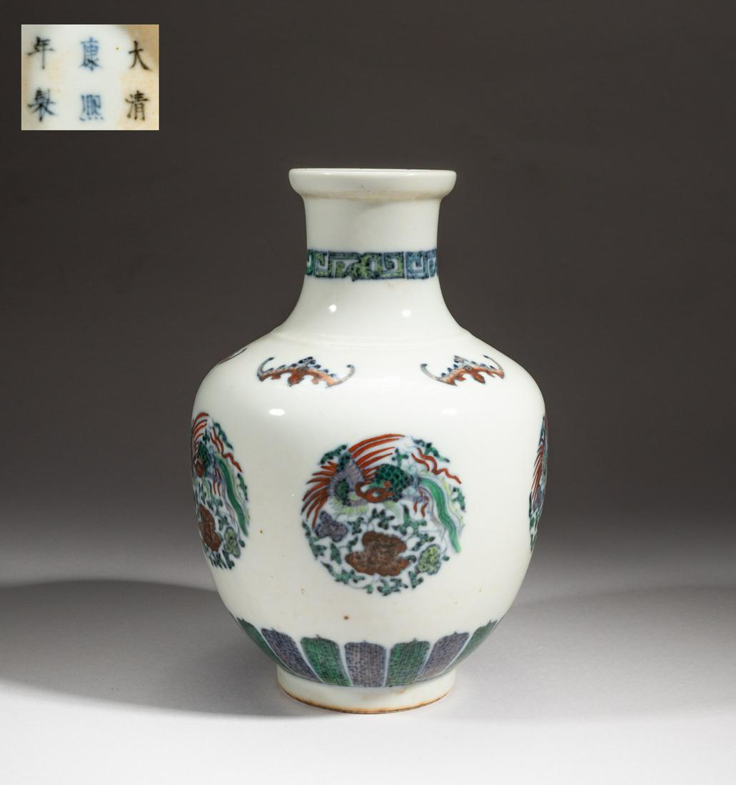 Chinese Douchait Porcelain Cabinet Vase: The ovoid body rising from a short foot to a columnar neck with dished rim, the exterior painted with five phoenix with outstretched wings and long tails among flower sprays forming in circular shape,