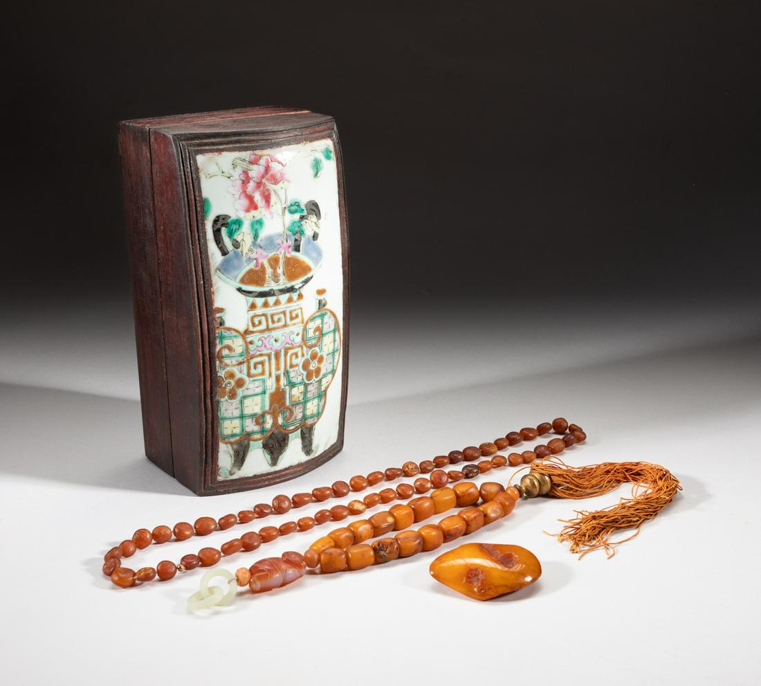 Chinese Amber Prayer Beads & Necklace: Including a string of amber prayer beads, an amber necklace and an amber brooch, with a covered box inlaid with a porcelain top, enameled with flowers placed in a stylized vase. Approx. 107 gram (tota