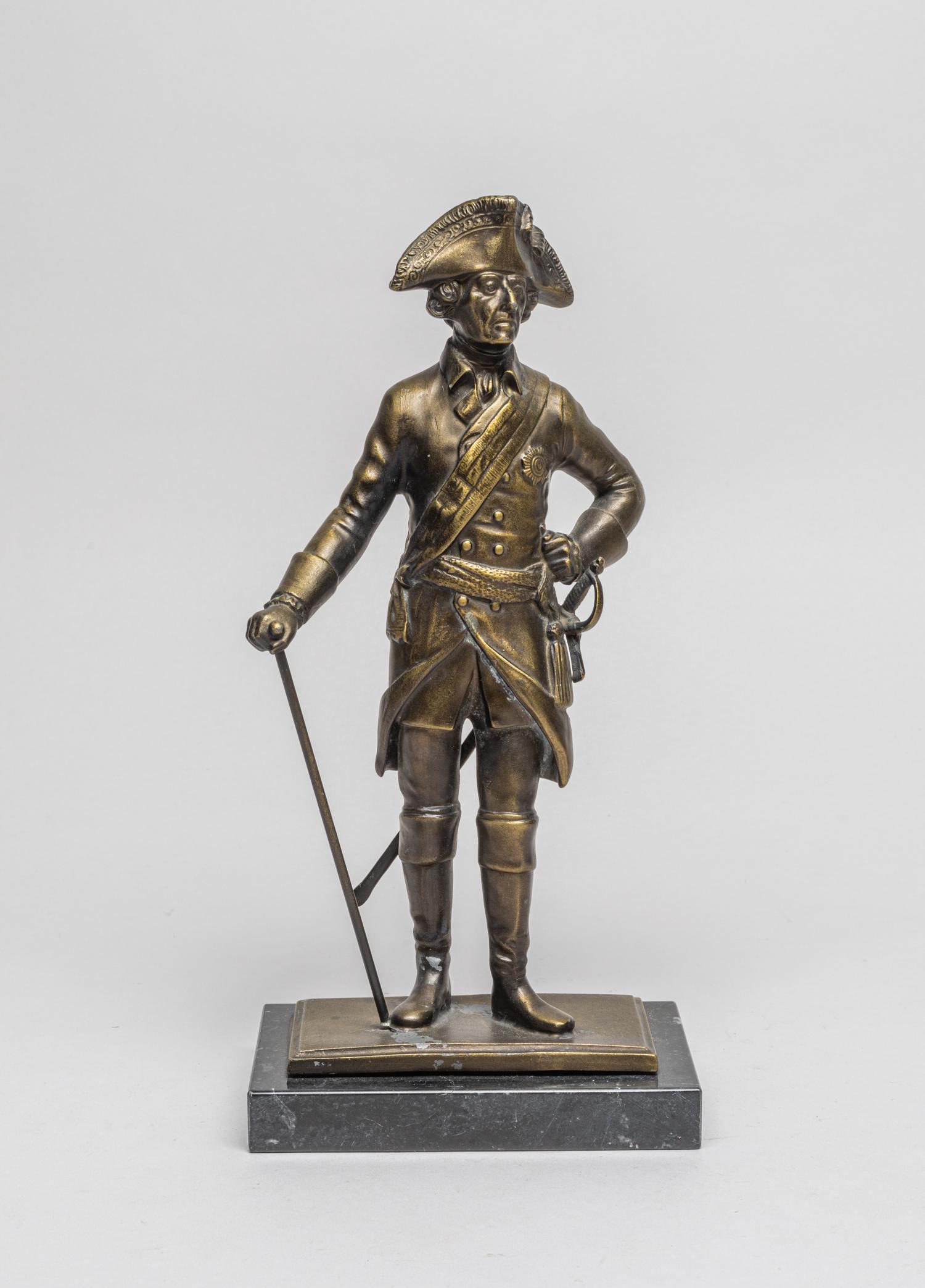 Frederick the Great Table Sculpture: The decorative table sculpture of Frederick the great sculpture, with a rectangular marble base. 10.5inch H, 5.1inch L, 3inch W (w/ stand).