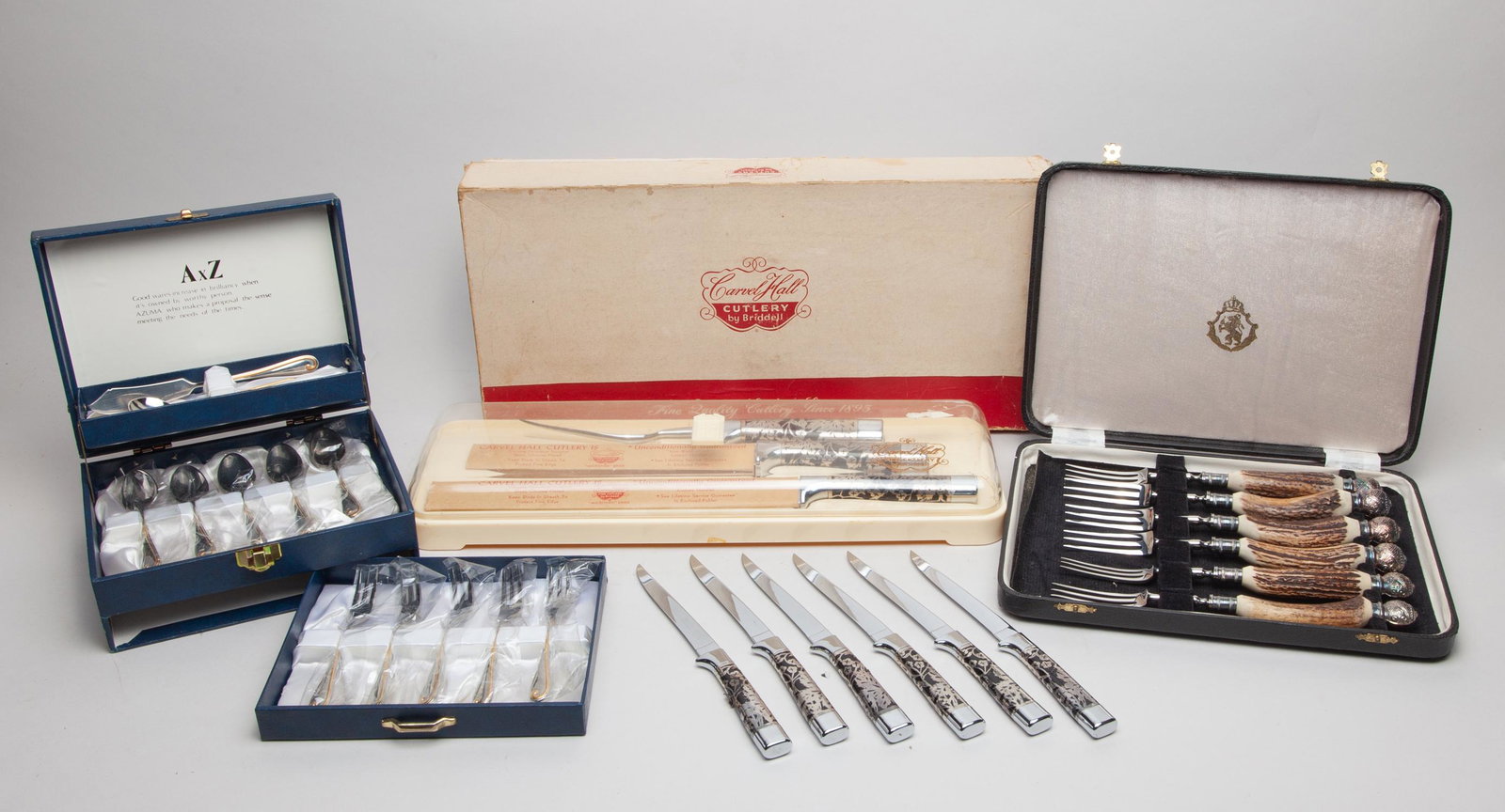 Azuma, Garvel Hall & Horn Handle Service: Three sets dinner service, including Azuma stainless, horn handle with silver services, and Garvel hall cutlery. 12.5 inch L. (largest)