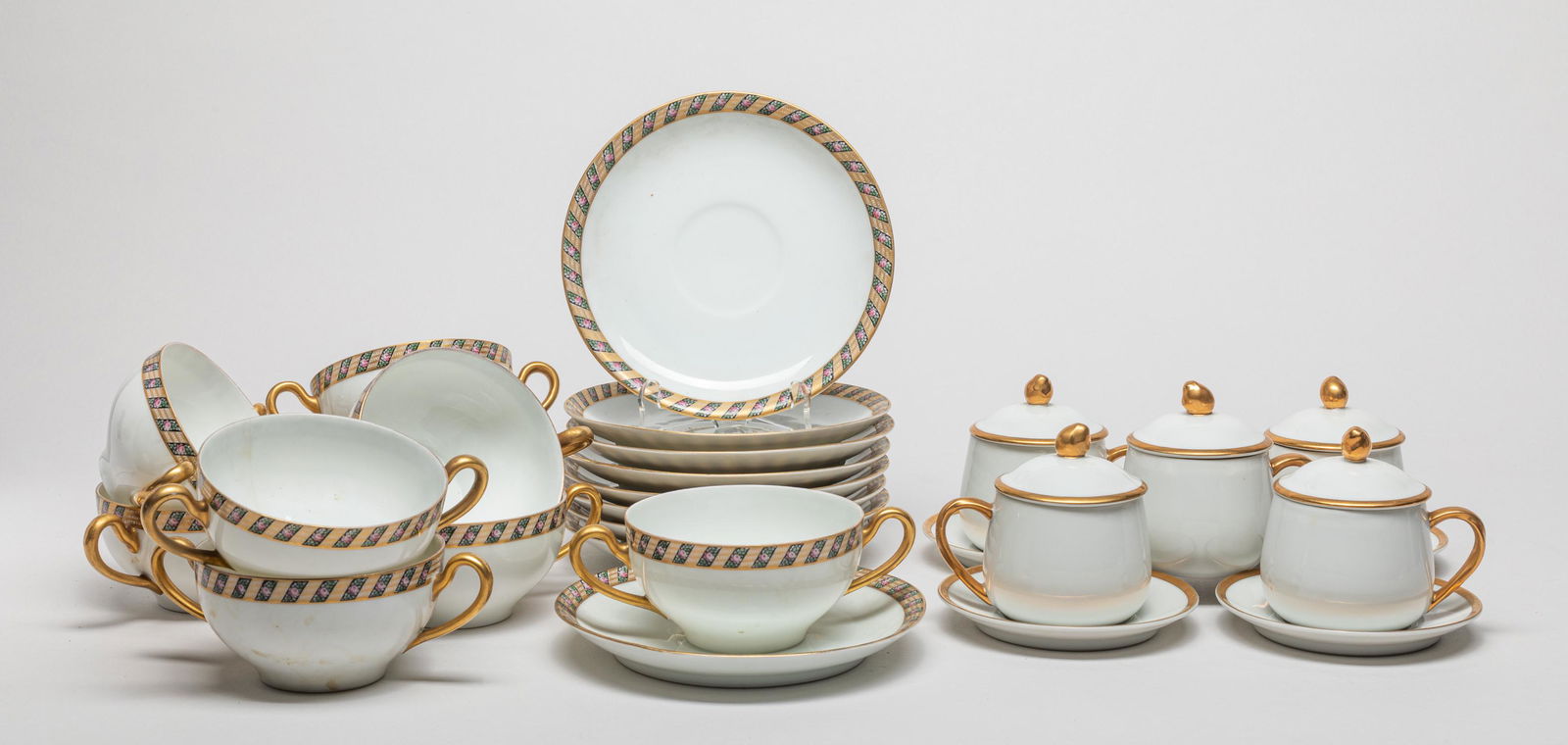 Collectible Porcelain Tea Set.: A large group of porcelain tea cups and saucers, the bottom marked FF or Krautheim Selb Bavaria. 5.27inch L, 3.65inch W, 2inch H (largest cup).