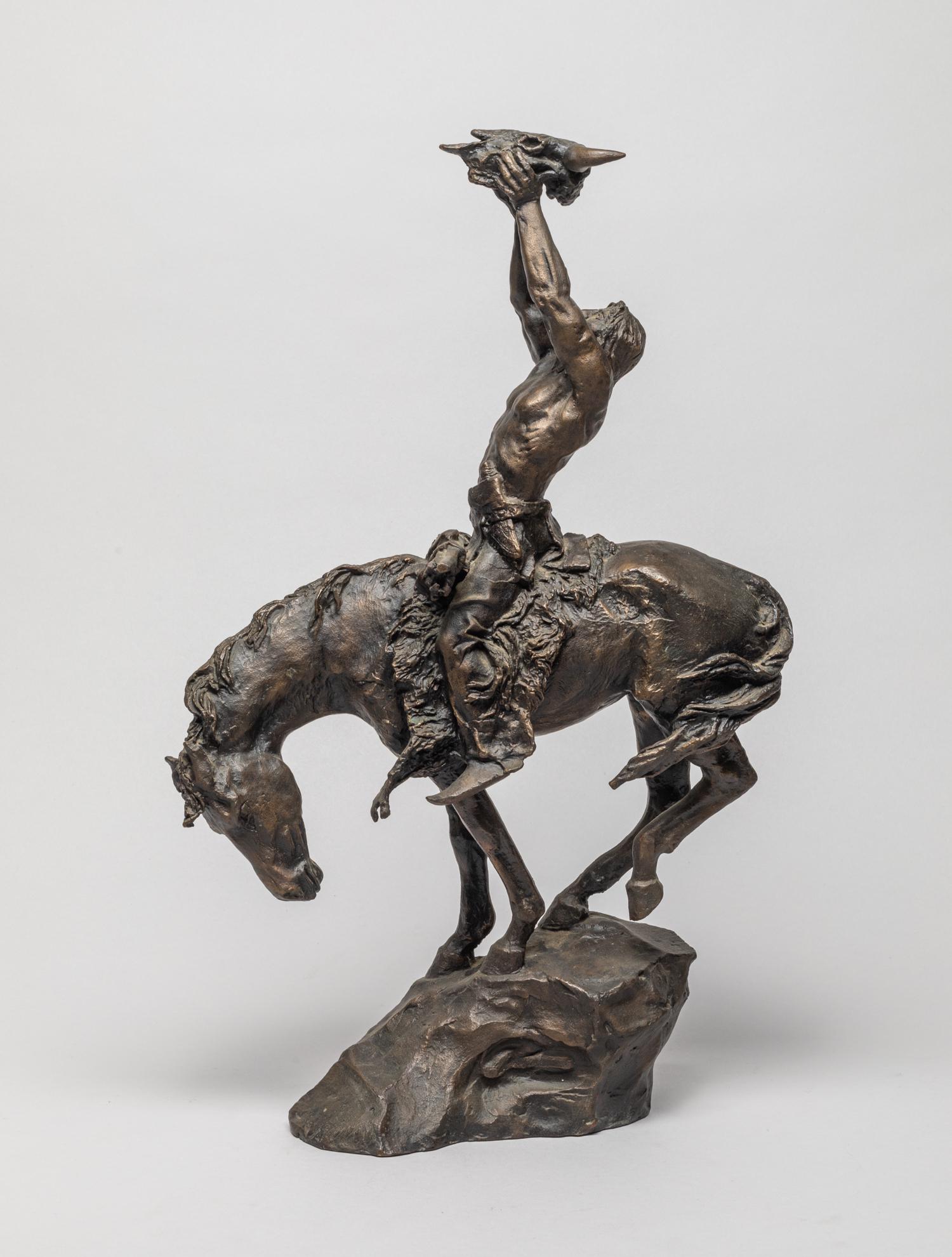 Collectible Vintage Bronze Sculpture: Moulded as a gallant warrior riding on a horse, his head looking up and hands holding a buffalo skull. 16.3inch H, 9.5inch L,