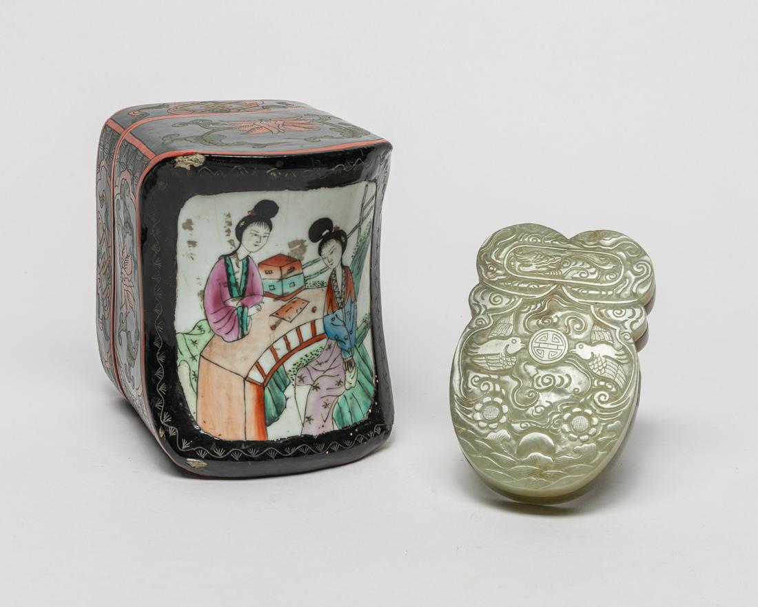 Chinese Jade in Carved Box: The celadon jade covered box of cicada form, the top side carved with a pair of birds surrounding a shou character among flowers and clouds and above waves, beneath an oval cartouche of dragon, with a