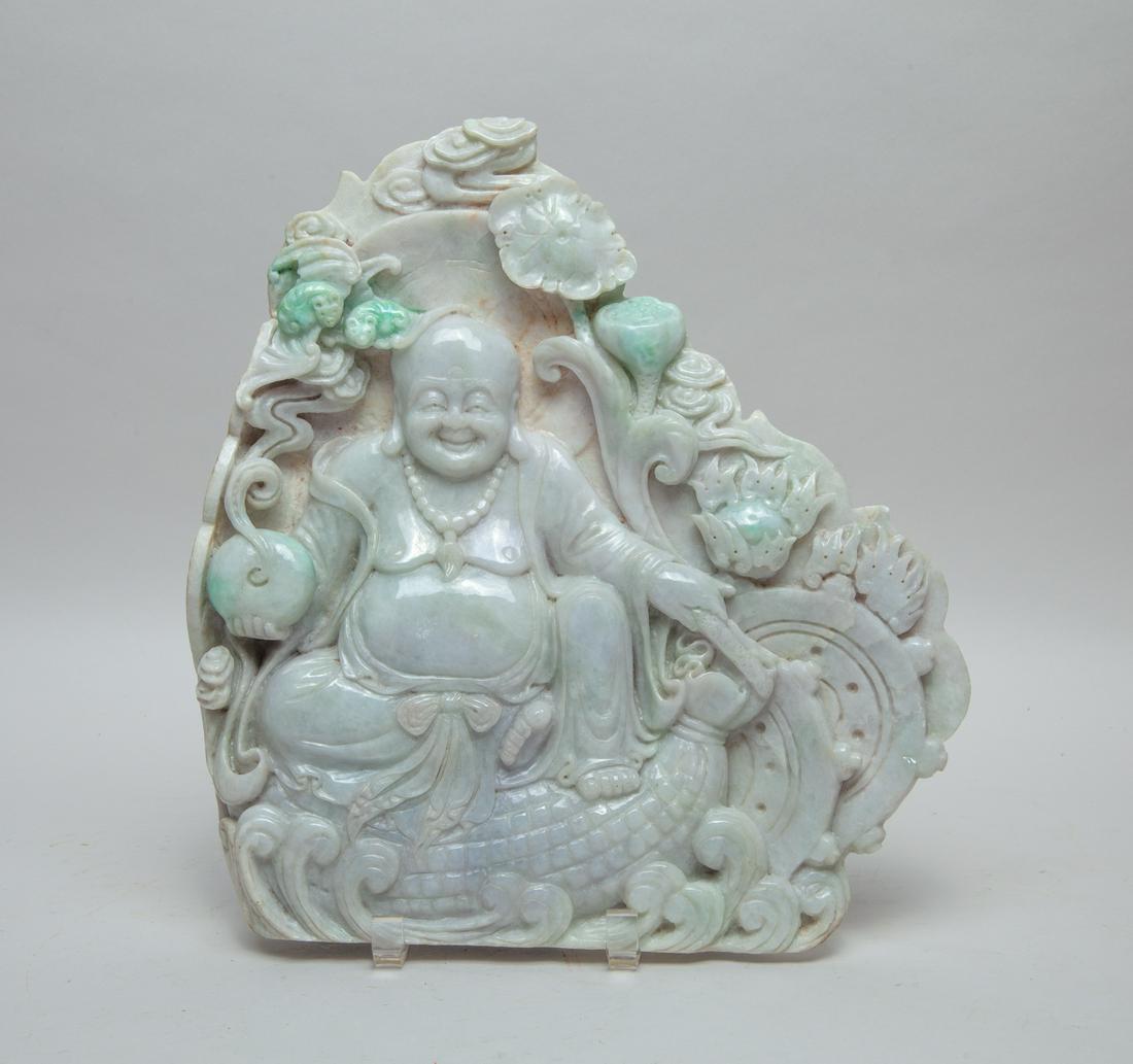 Large Chinese Jade/Jadeite Sculpture of Buddha: Carved with Buddha seated on a bundle above waves, his right hand holding a beribboned ball, amid lotus, ruyi, bats and flaming pearls. 13inch H, 12.4inch W.