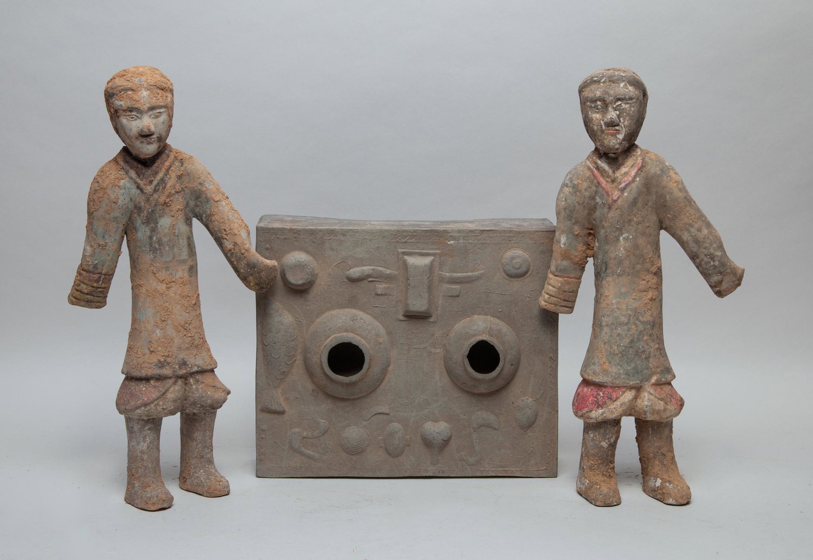 Chinese Han Type Pottery Piece: Two Han type pottery figure sculptures and a pottery mould in rectangular shape. 14.5inch H, 6.7inch W (figure size).