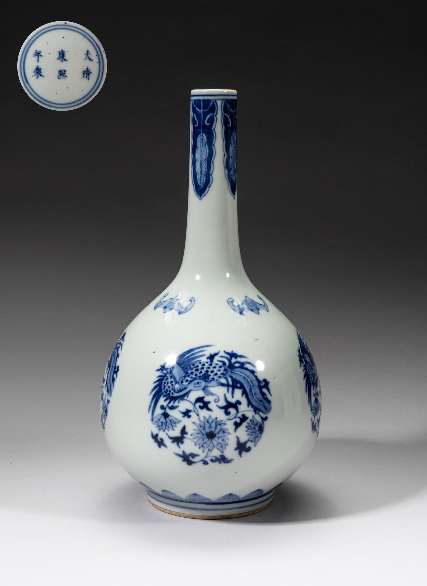Chinese Export Blue & White Porcelain Vase: The pear-shaped body rising from a short foot to a tall slender neck, the exterior decorated with four phoenix and lotus roundels, interspersed with four bats, between friezes of leaves and lotus peta