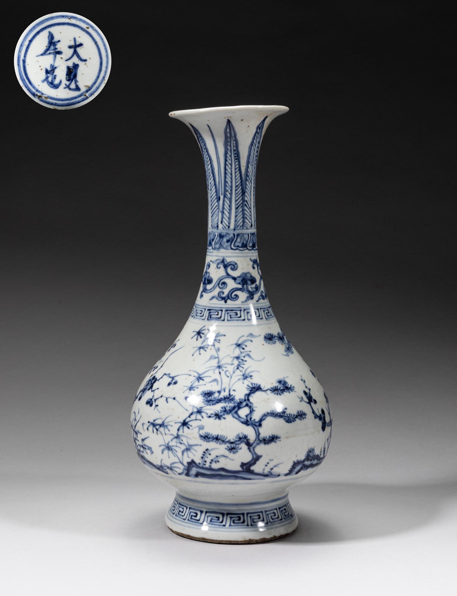 Chinese Shipwreck Type Porcelain Vase: The pear-shaped body rising from a splayed foot to a tall waisted neck and flared rim, the exterior painted with pine trees, plum blossom trees and bamboo, beneath bands of flower sprays and upright l