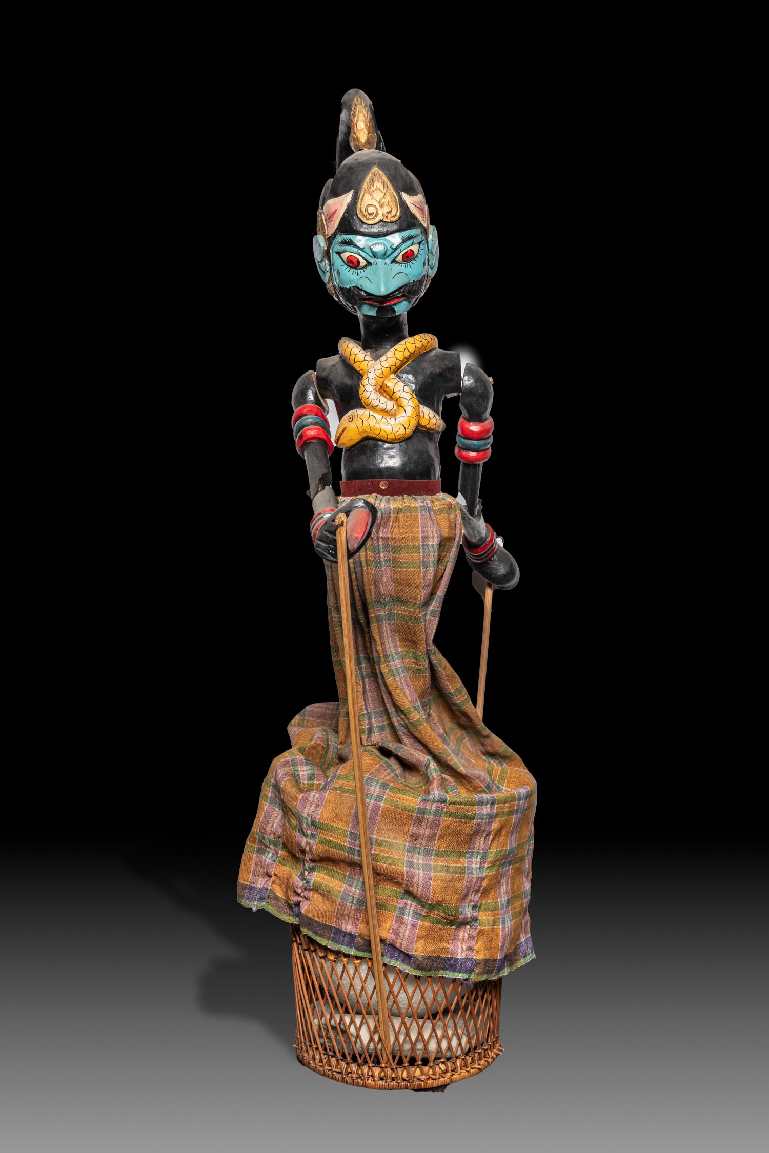 Antique Thai Ramayana Warrior Folk Doll: Rare Thai Ramayana folk mythical warrior doll, with rotatable joints and exaggerated face, supported on a basket base. Approx. 29inch H, 8inch W.