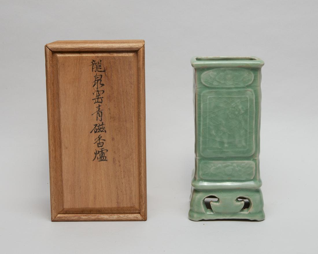 Chinese Longquan Type Porcelain Vase: Of square section, each side carved in low relief with a beast and flowers, covered the inside and out with a crackled celadon glaze, with box. Approx. 7.6inch H, 3.6inch L, 3.6inch W (w/o box).